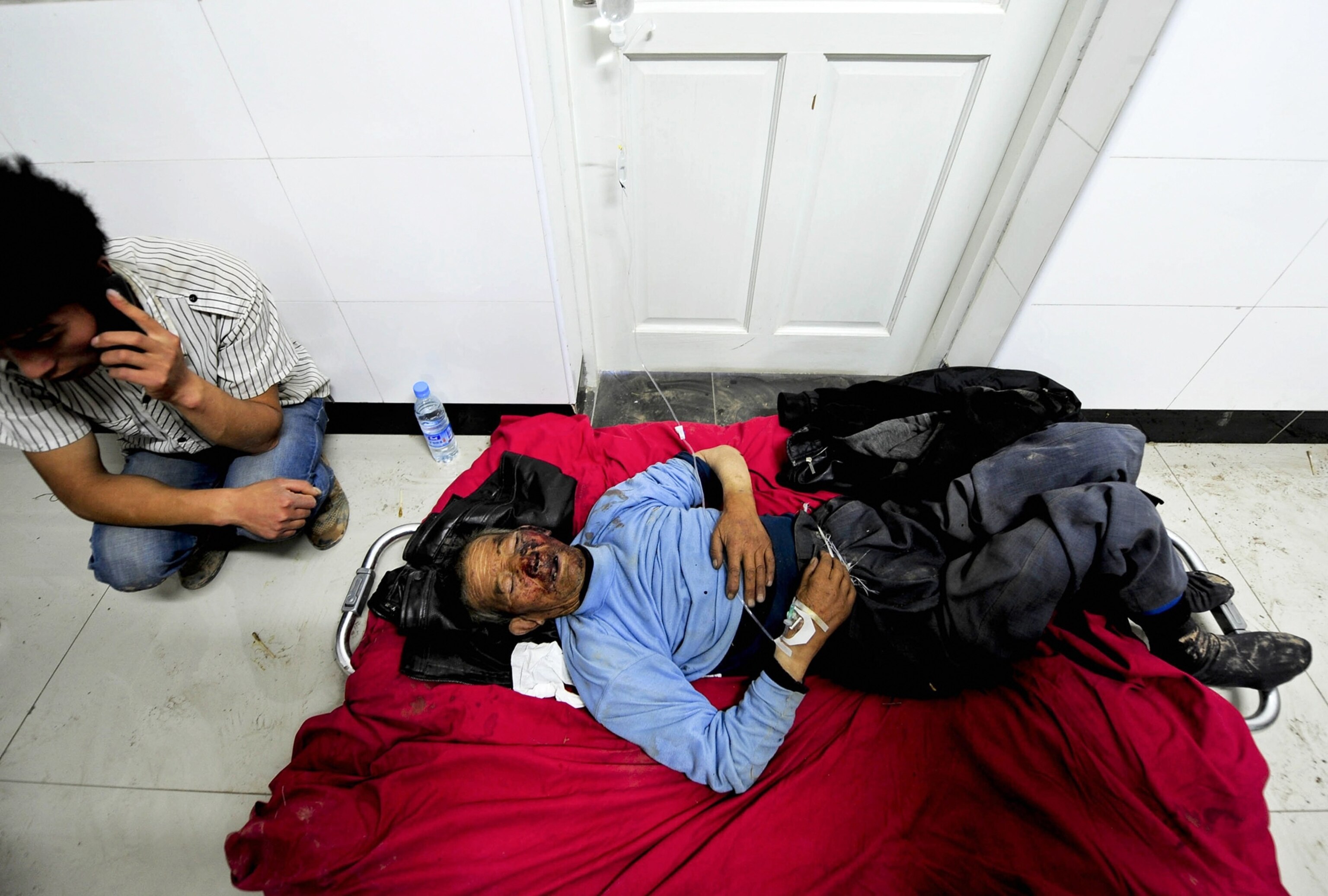 a man in a hospital after an earthquake.