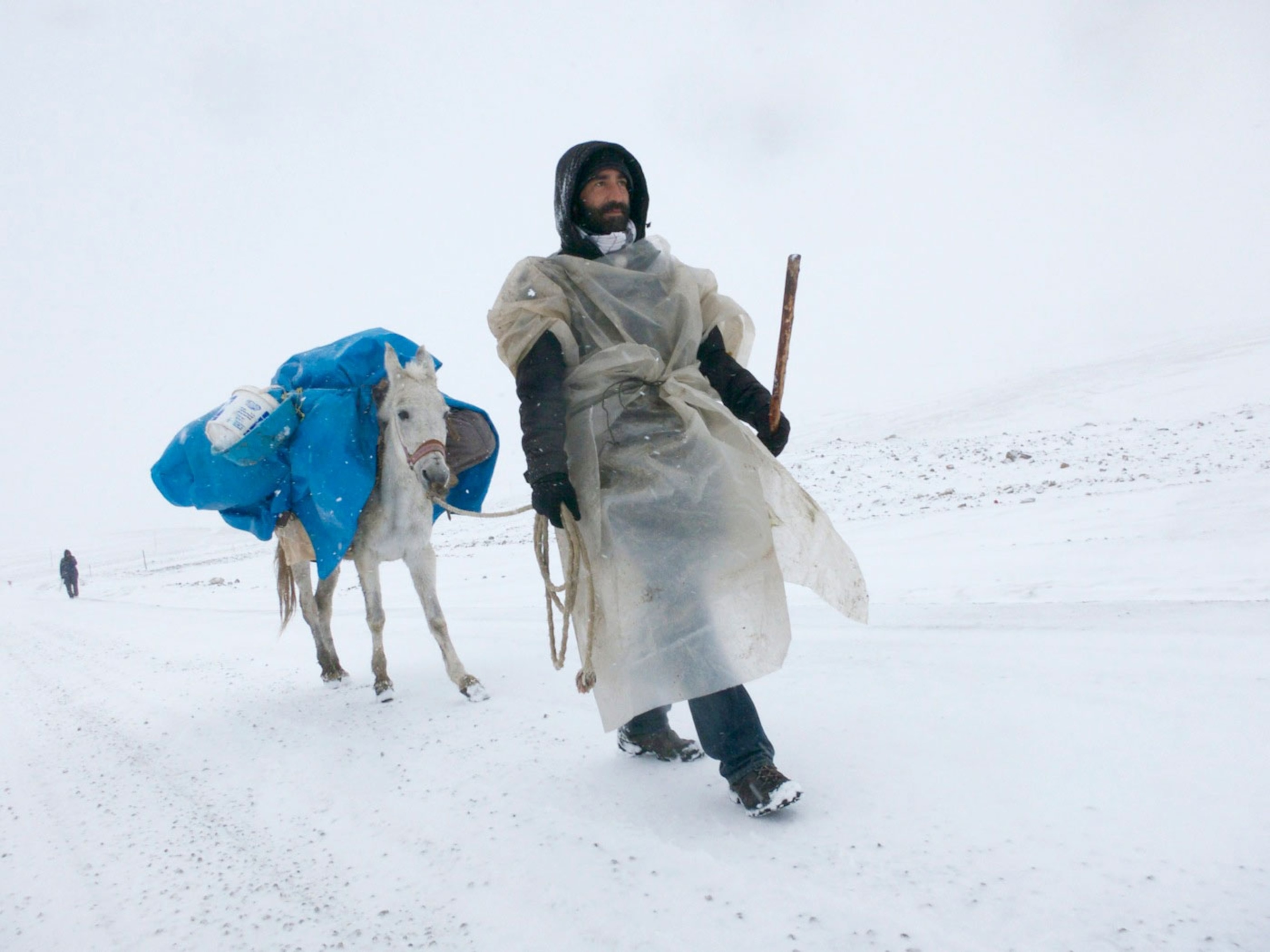 Walking partners have accompanied Salopek throughout the trail since the beginning, as local guides, companions and often story contributors to the Out of Eden Walk. Matthieu Chazal (pictured), who walked with Salopek more than a decade ago for a month, leads the mule named Kirkatir down to the Turkey-Georgia border. Near Posof, Turkey. In “The Forgiving Moment,” Salopek pays tribute to his walking partner and friend, who passed away in 2024.