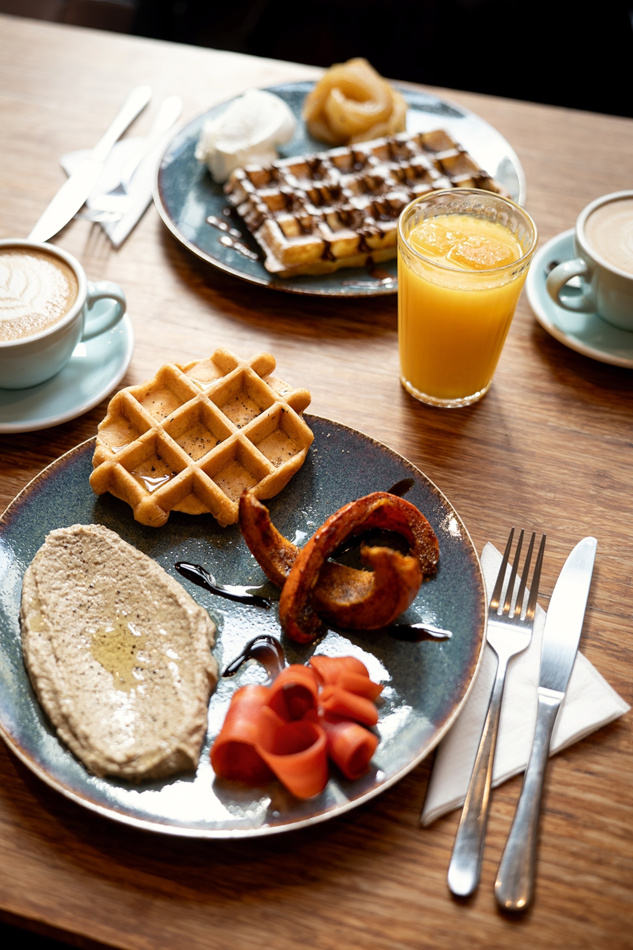 A brunch platter on a wooden table.