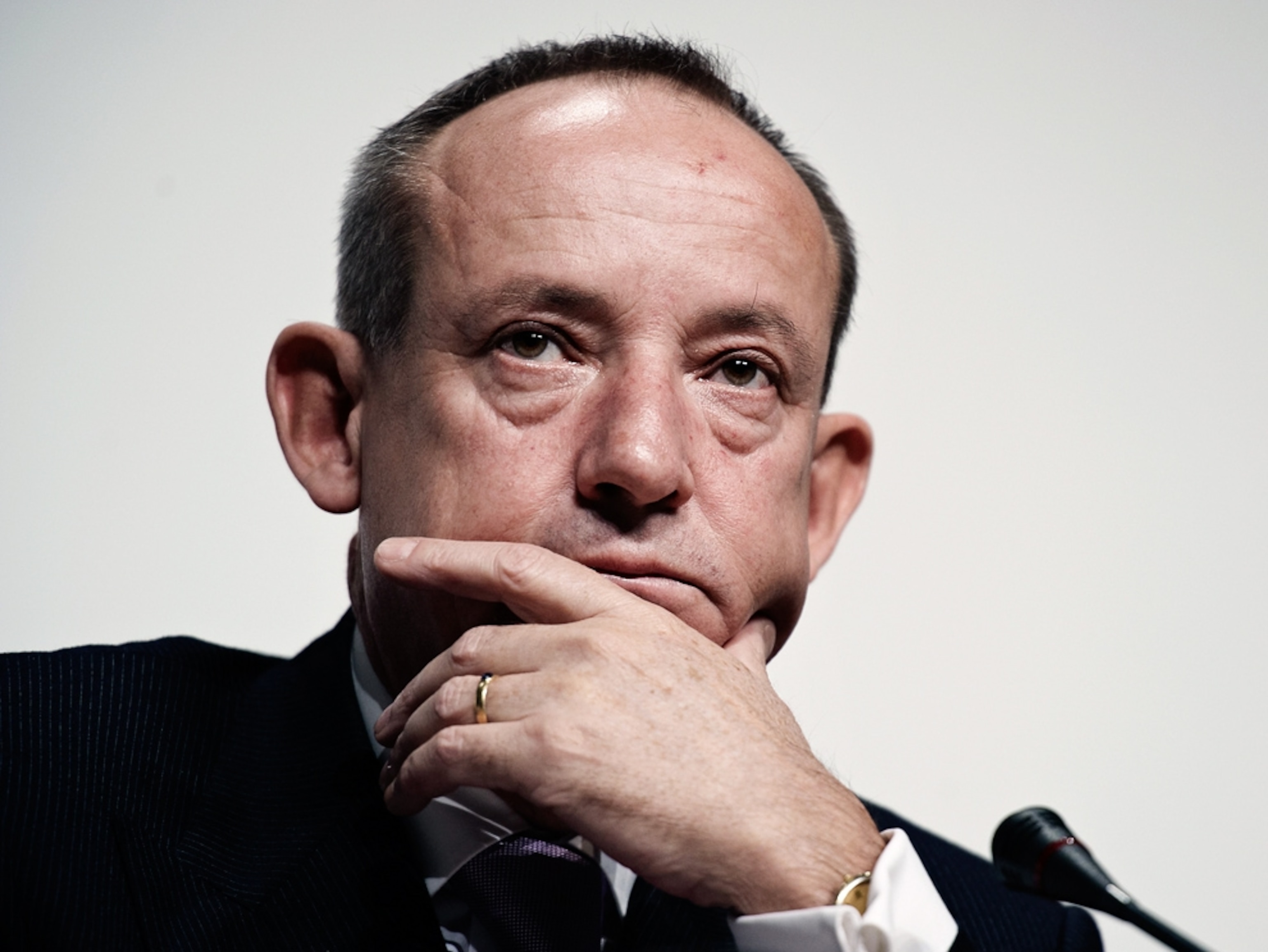Yvo de Boer listens to questions during a Copenhagen climate change summit.
