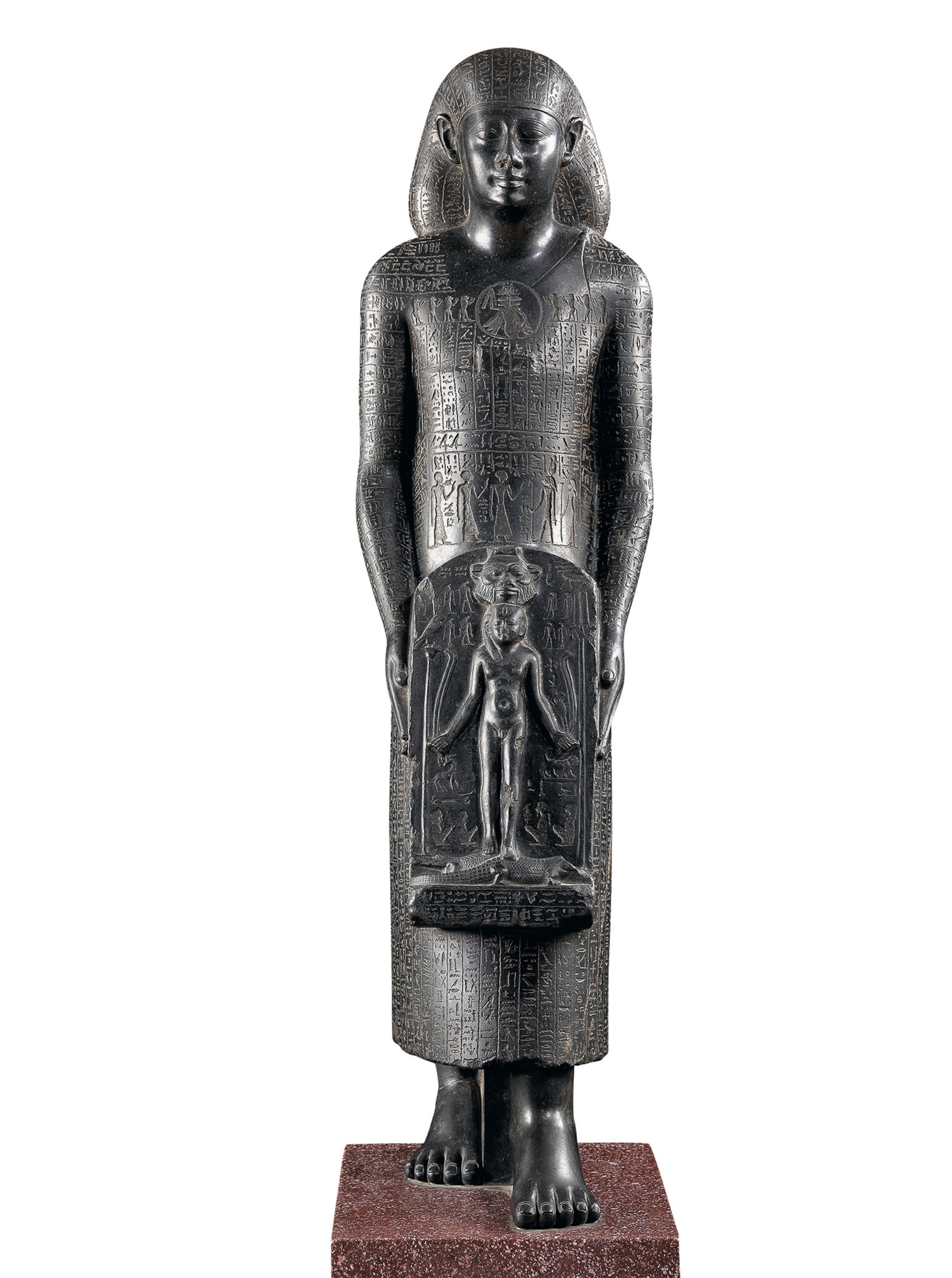 The priest Padimahes is depicted walking.