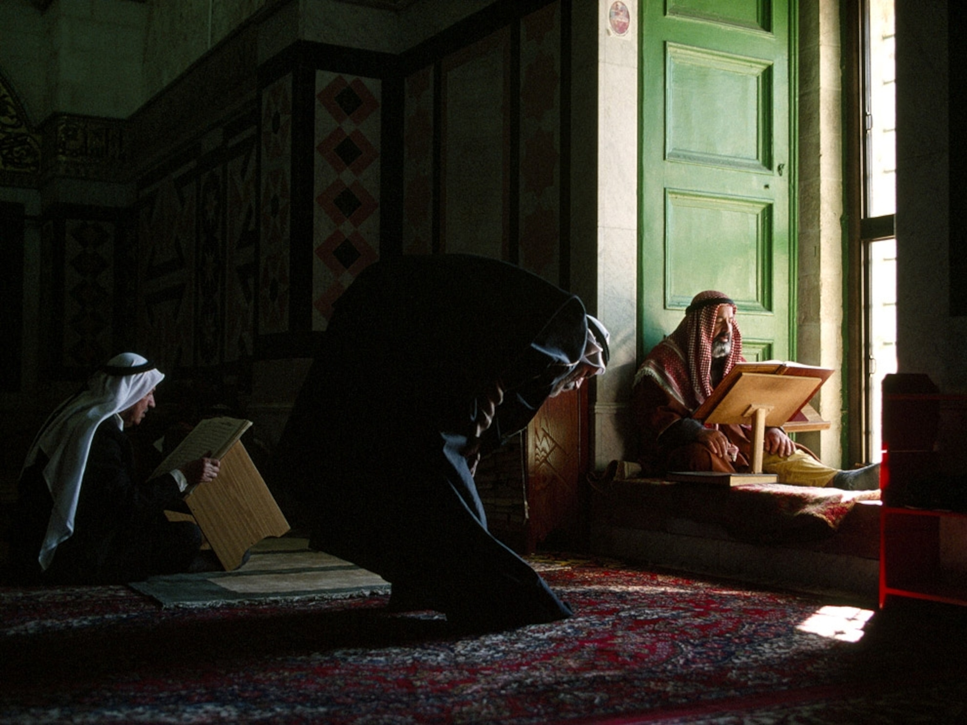 Man reading the Koran