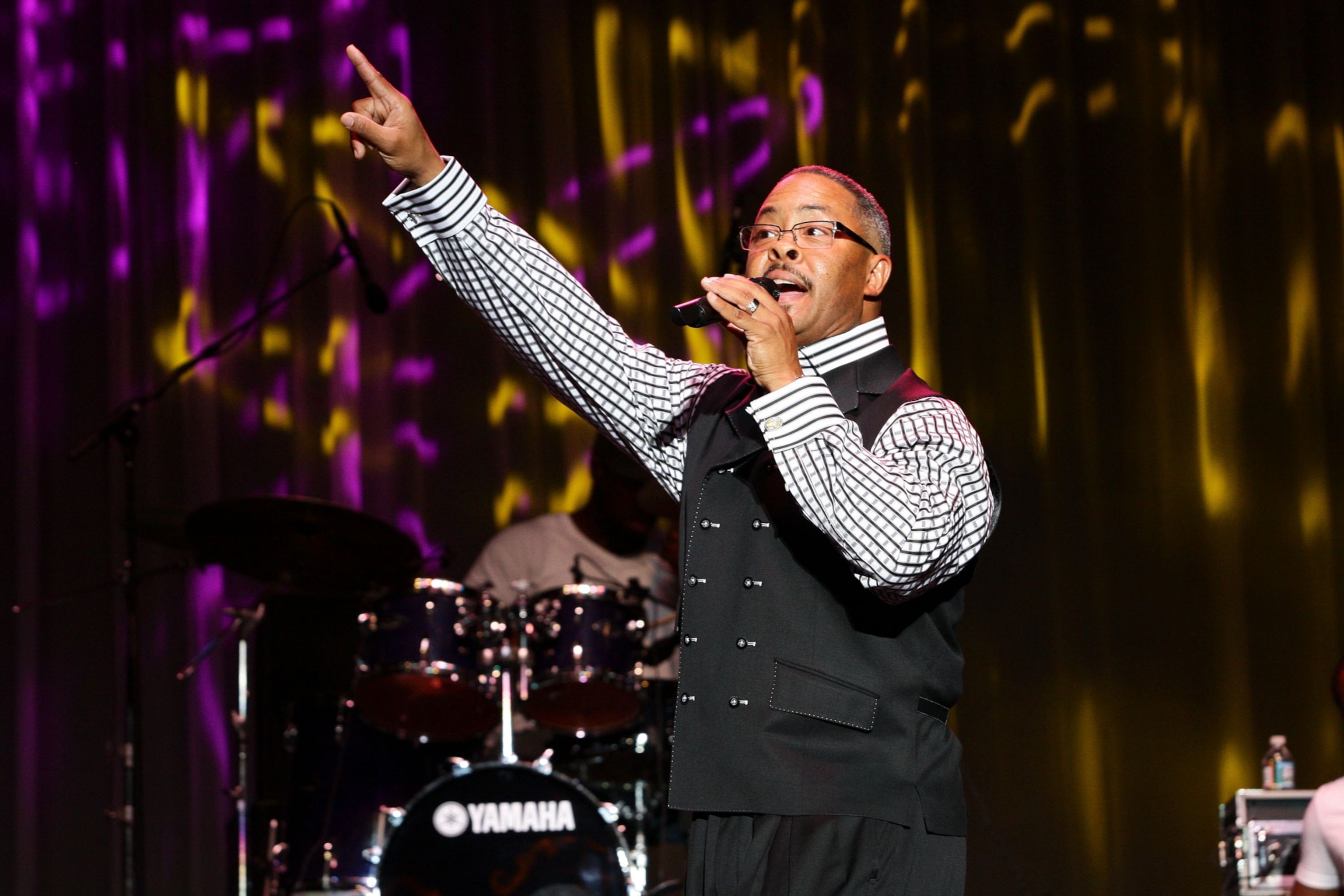 a pastor performing at a concert