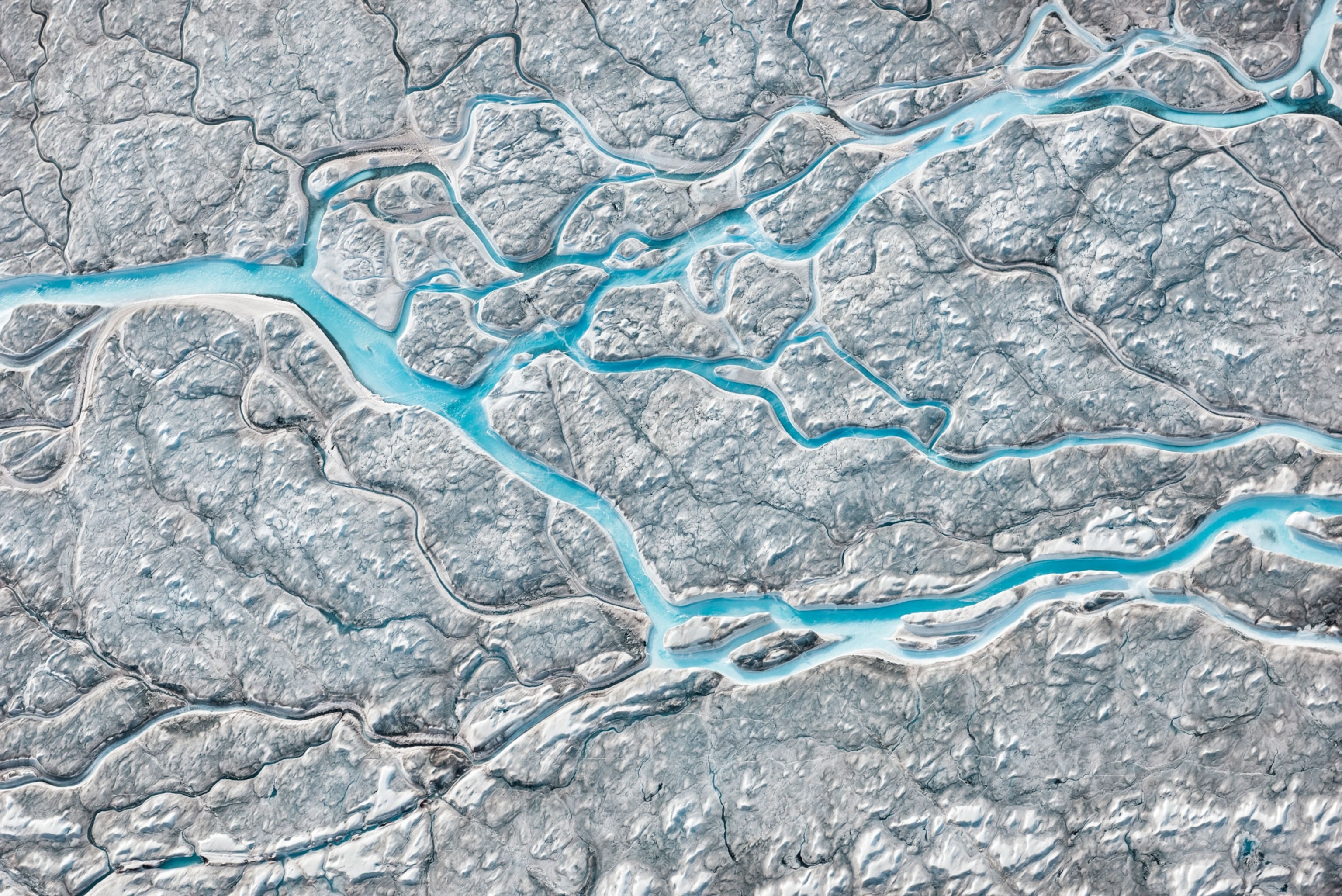 meltwater flowing across the top of the Greenland ice sheet