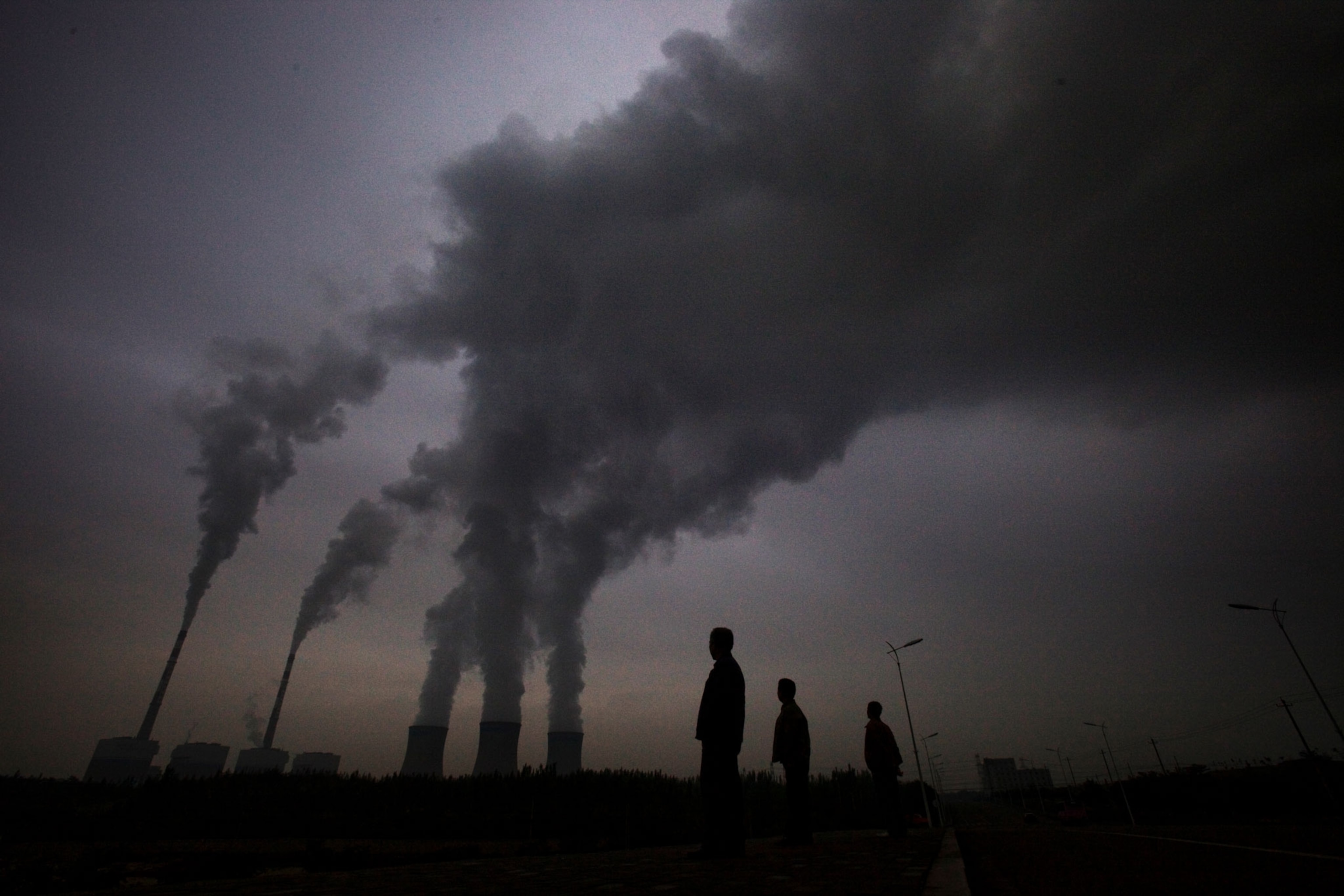 smoke billowing from a coal-fired power plant in China