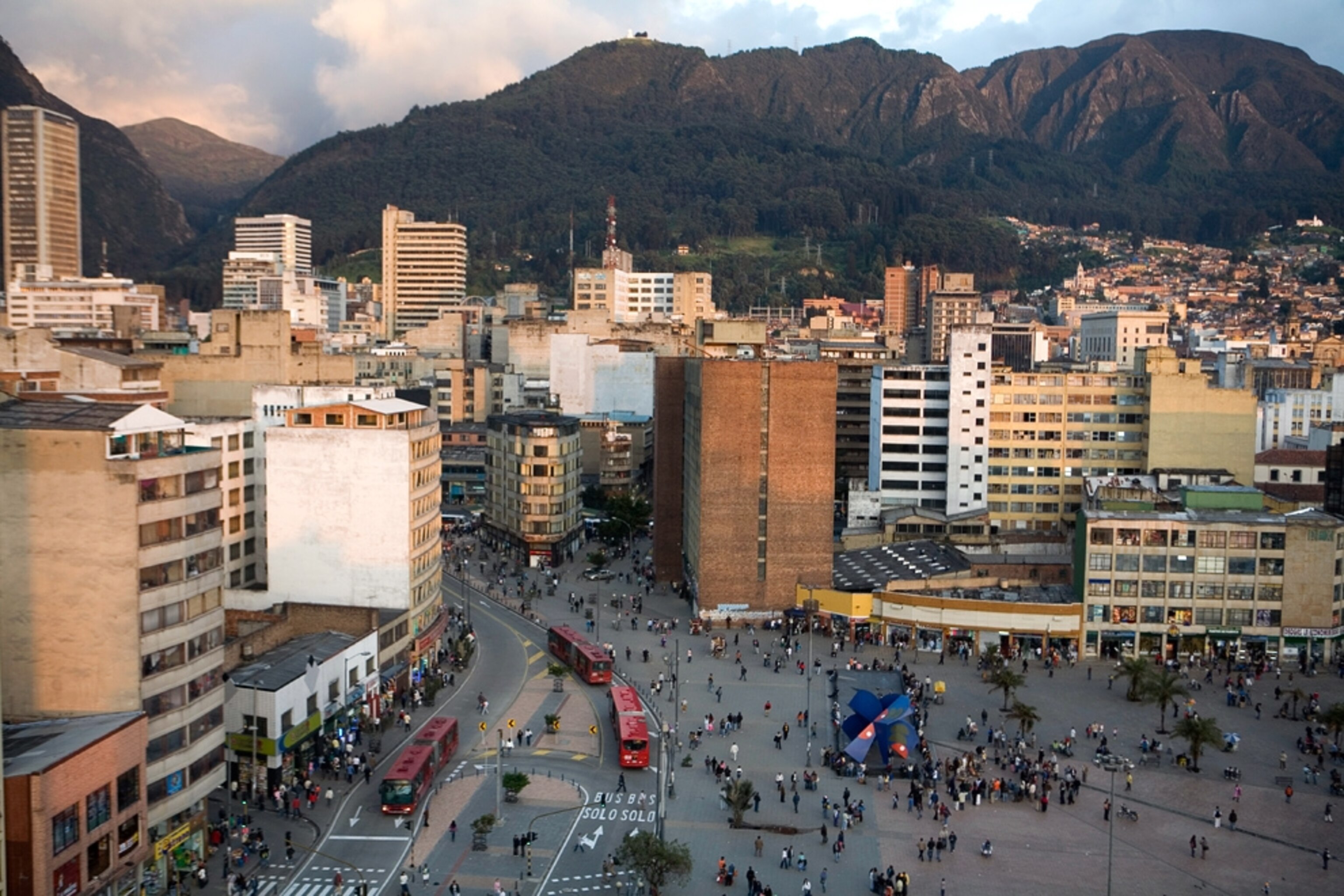 TransMilenio buses in a Bogotá plaza