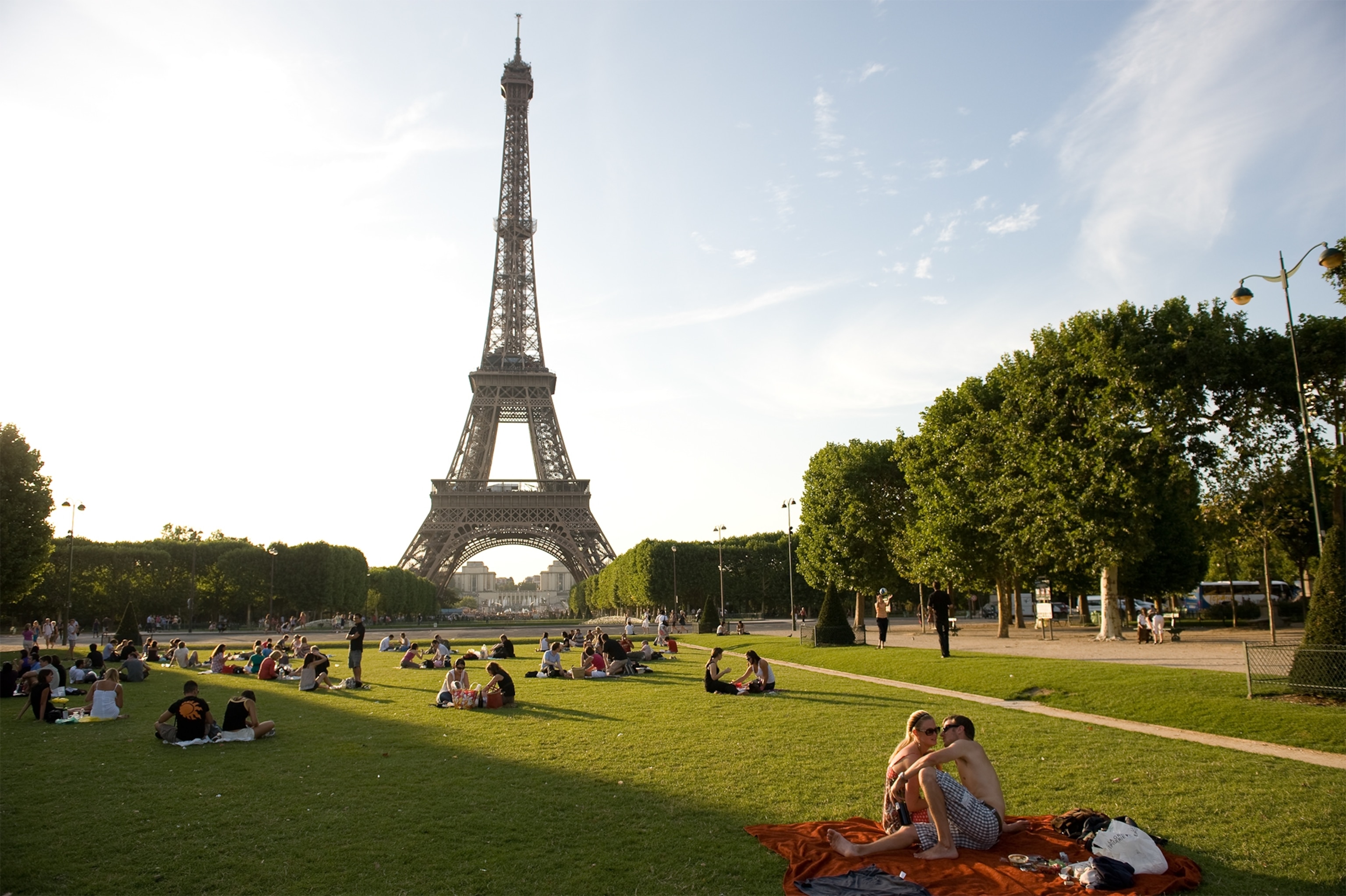 people having picnics near the Eiffel Tower in 2009.
