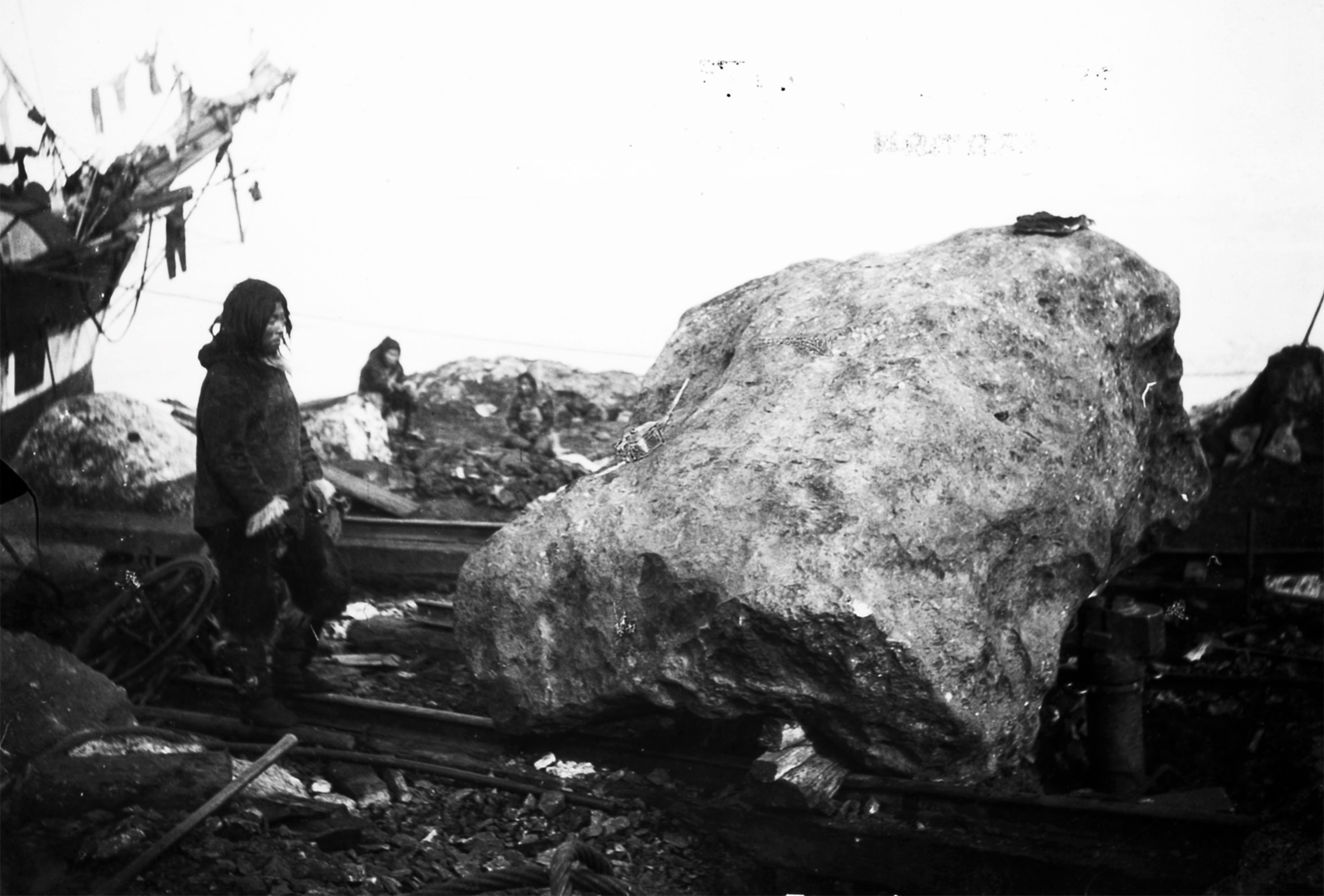 the meteorite on wooden skids next to the ship Hope
