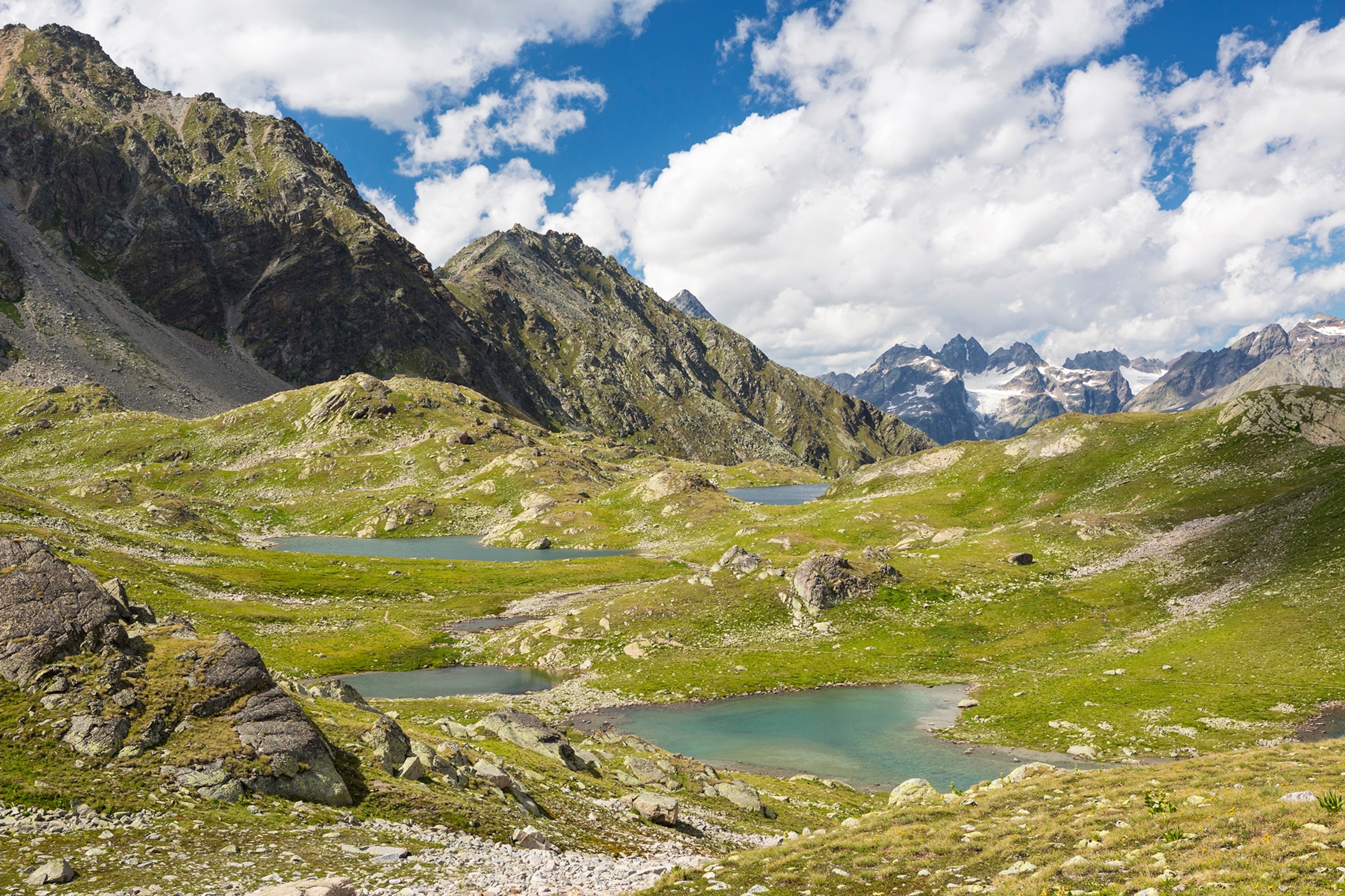 An Alpine plateau with multiple small lakes in the landscape.
