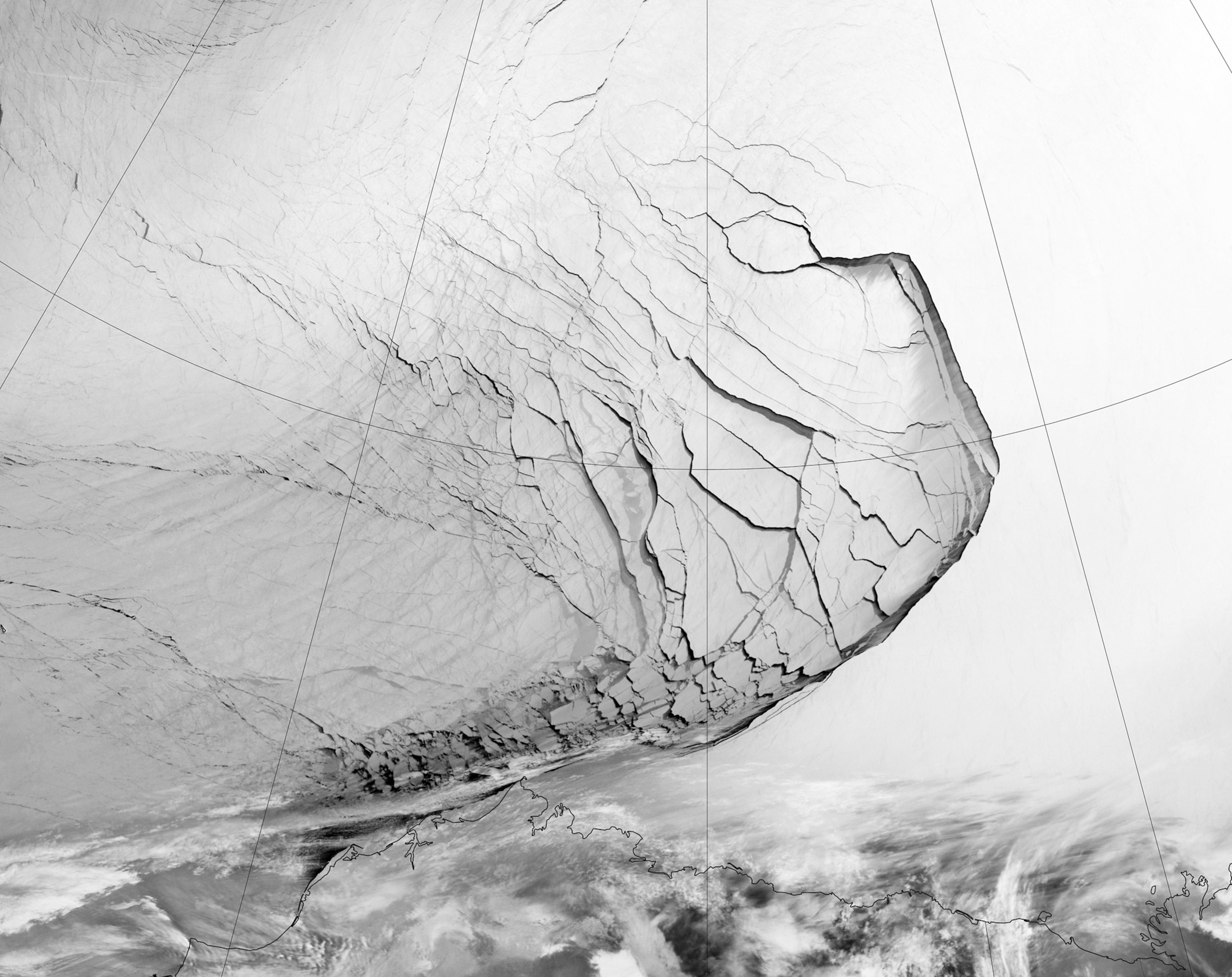 Satellite view of extensive fractures in sea ice off the coast of Alaska.
