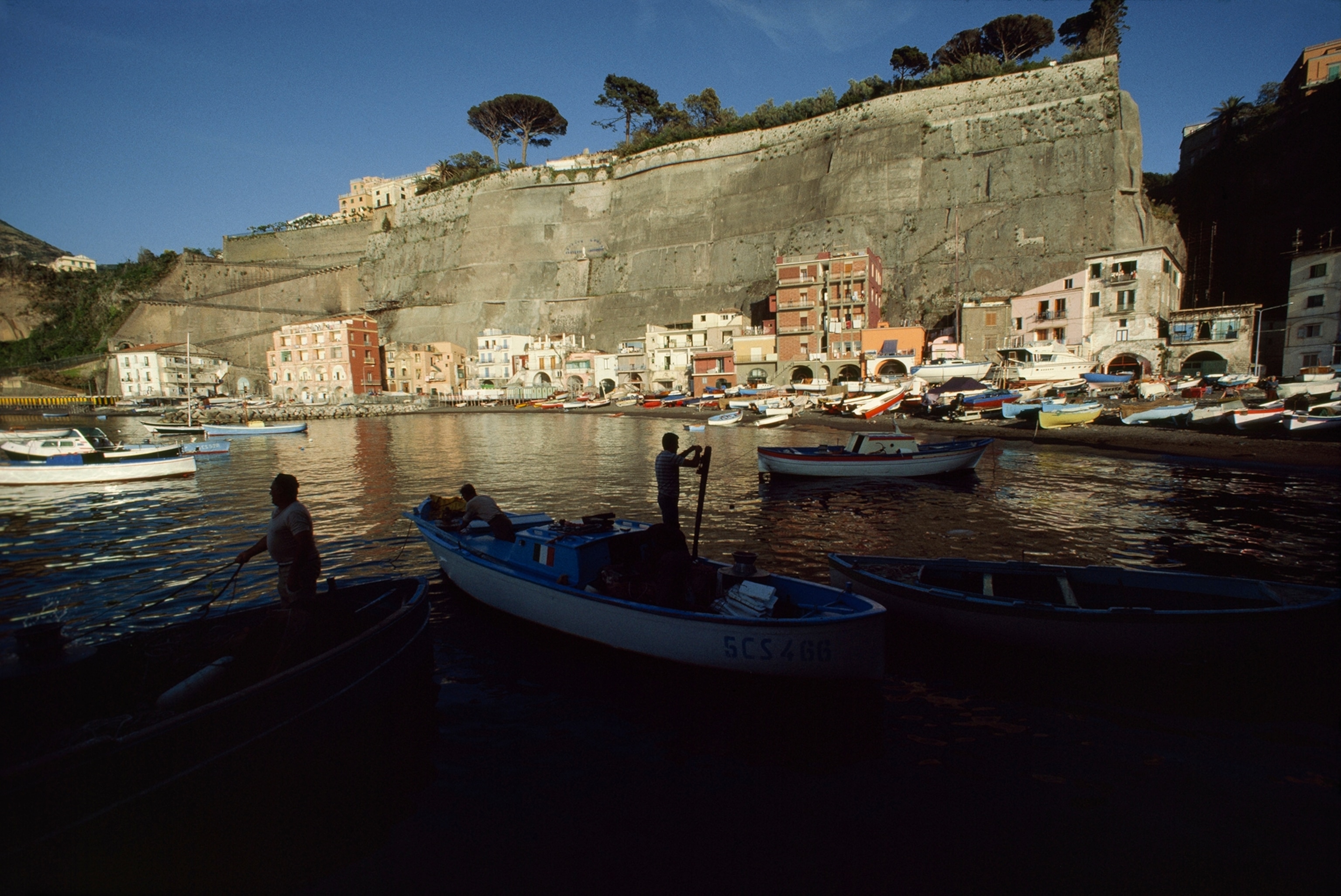 Fishermen prepare to go to sea for a night of anchovy fishing.