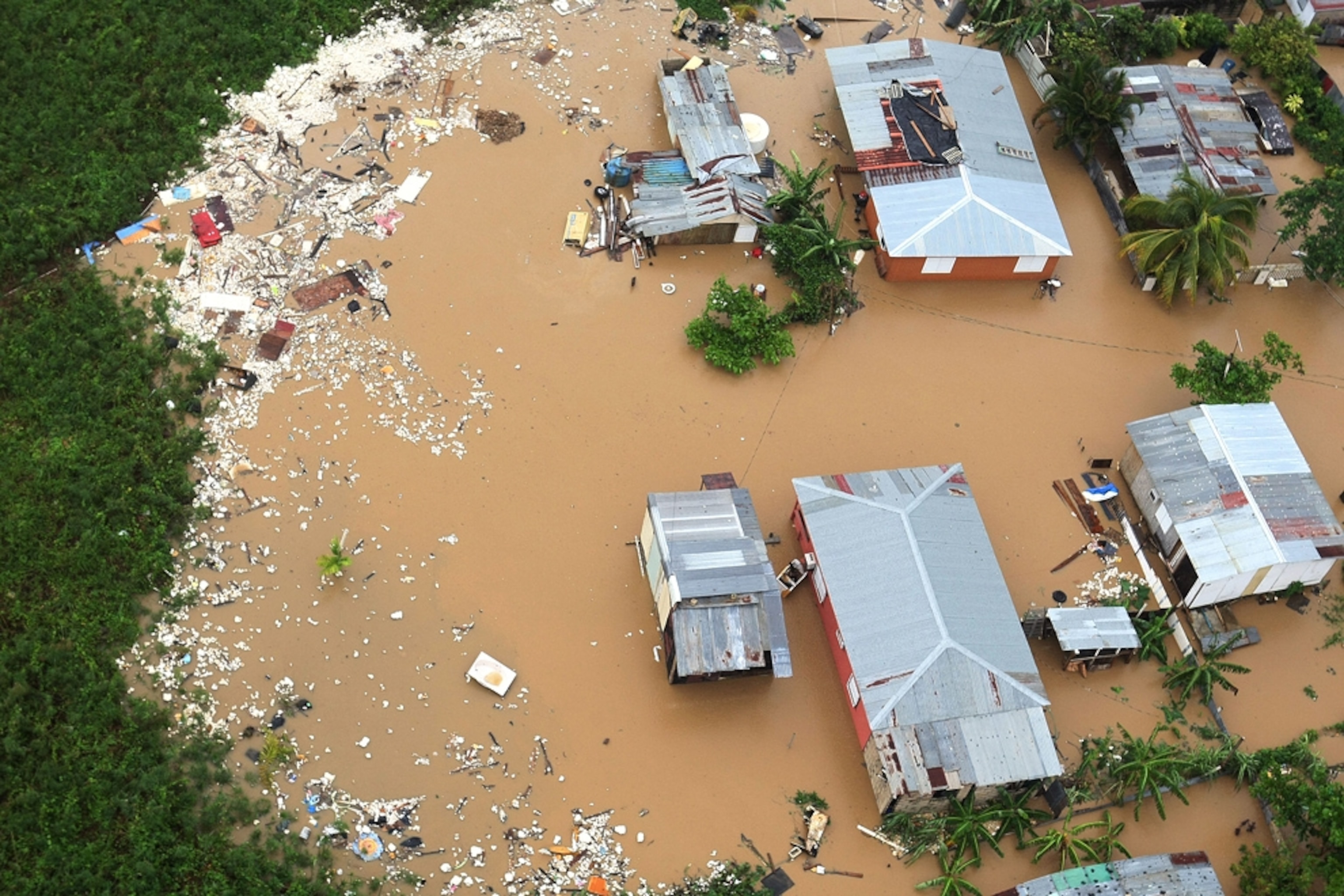 Houses in Canovanas, Puerto Rico were flooded by Hurricane Irene on Monday.