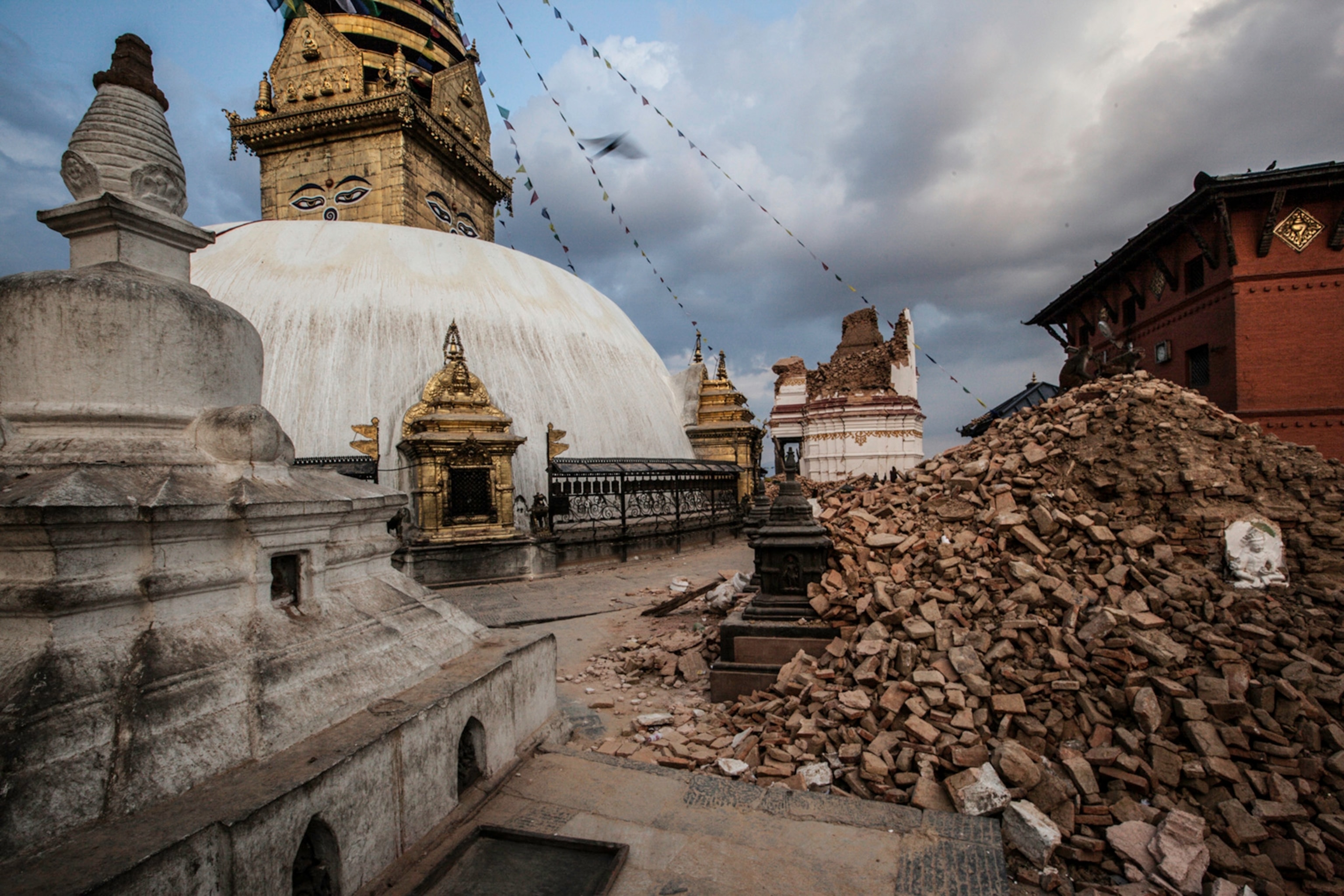 Damage to the Swayambhunath Buddhist stuppa was extensive including this collapsed tower