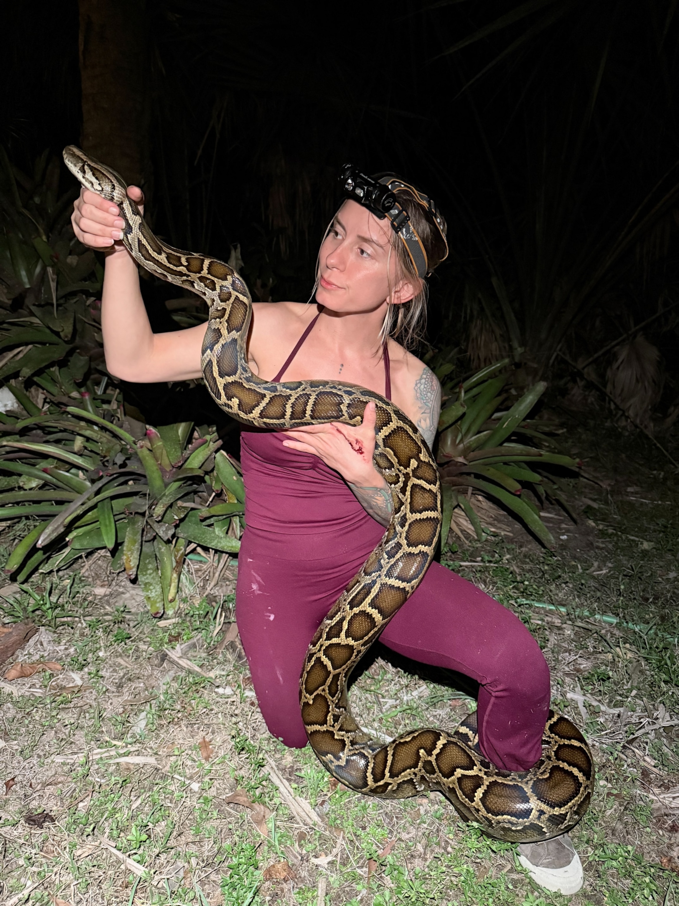 Taylor Poses with a python