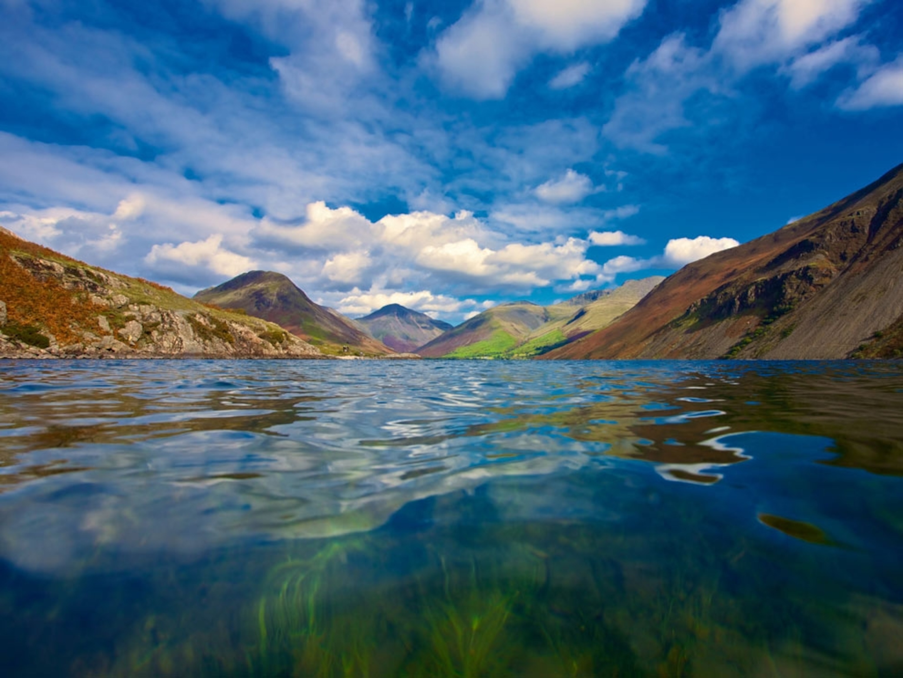 Close-up of lake with hills