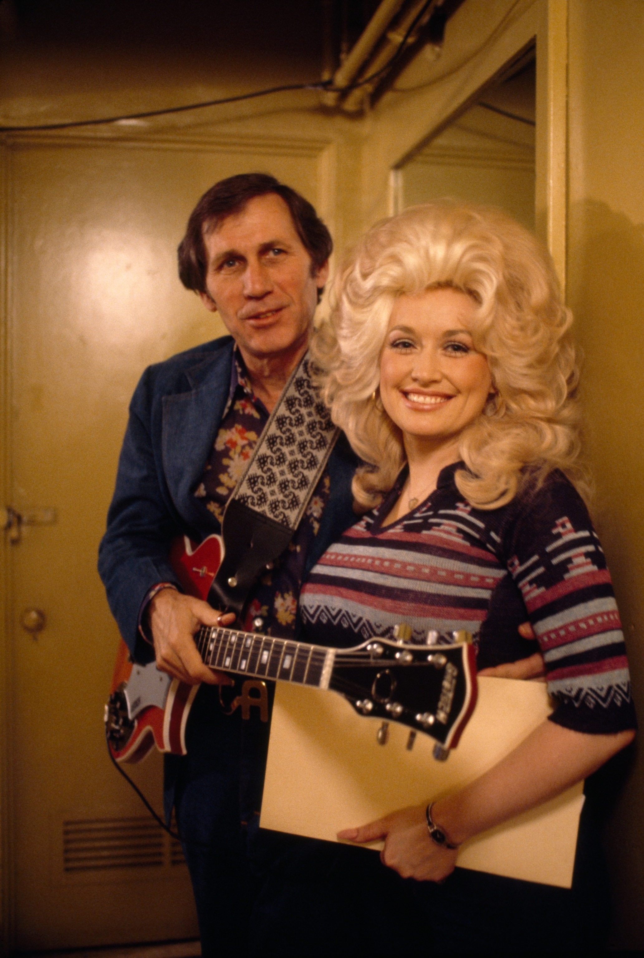 Country music legends, Chet Atkins and Dolly Parton.