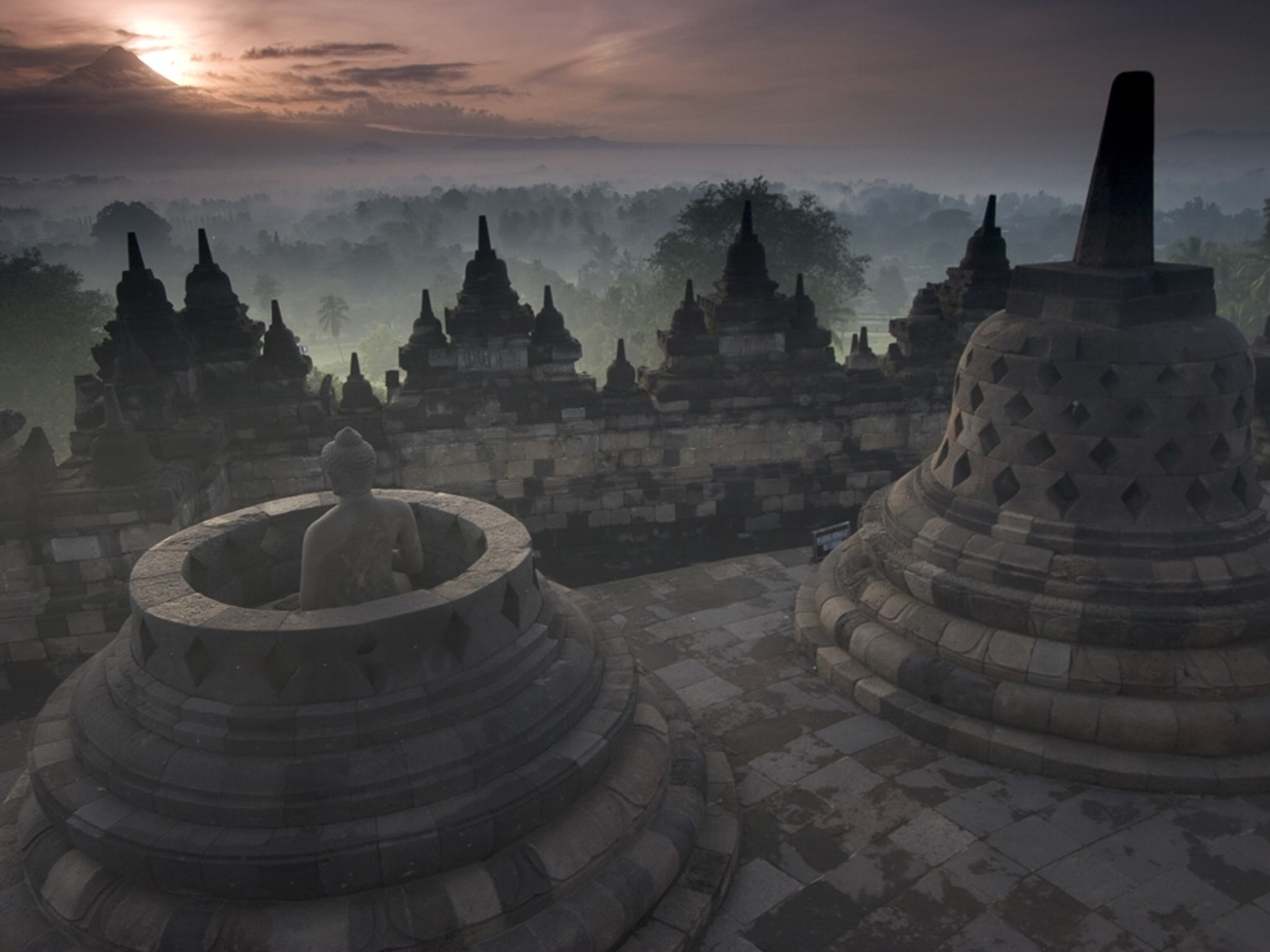 Borodudur Monument against the backdrop of Mount Merapi