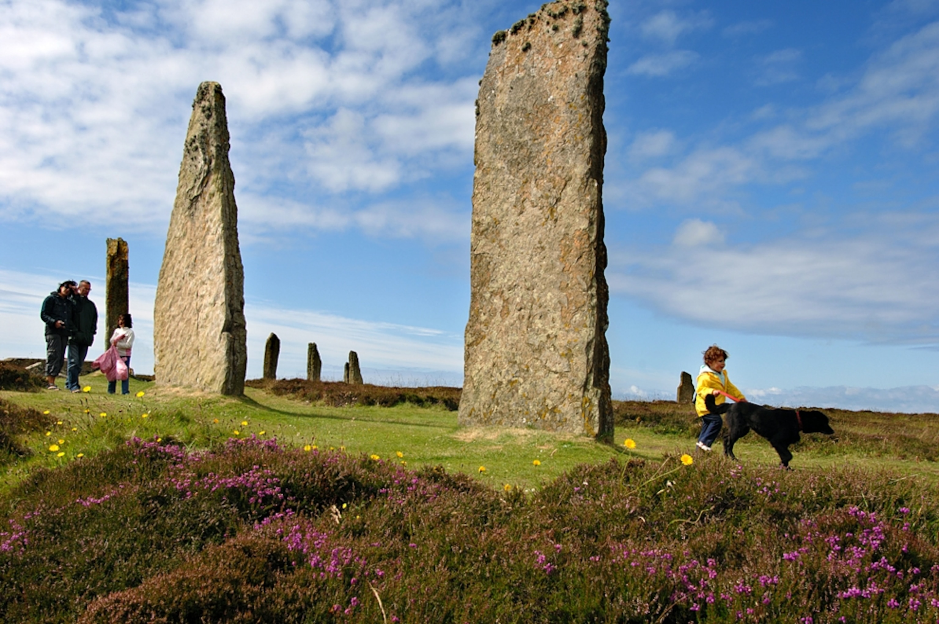 a family at the Ring of Brodgar, Orkney, Scotland