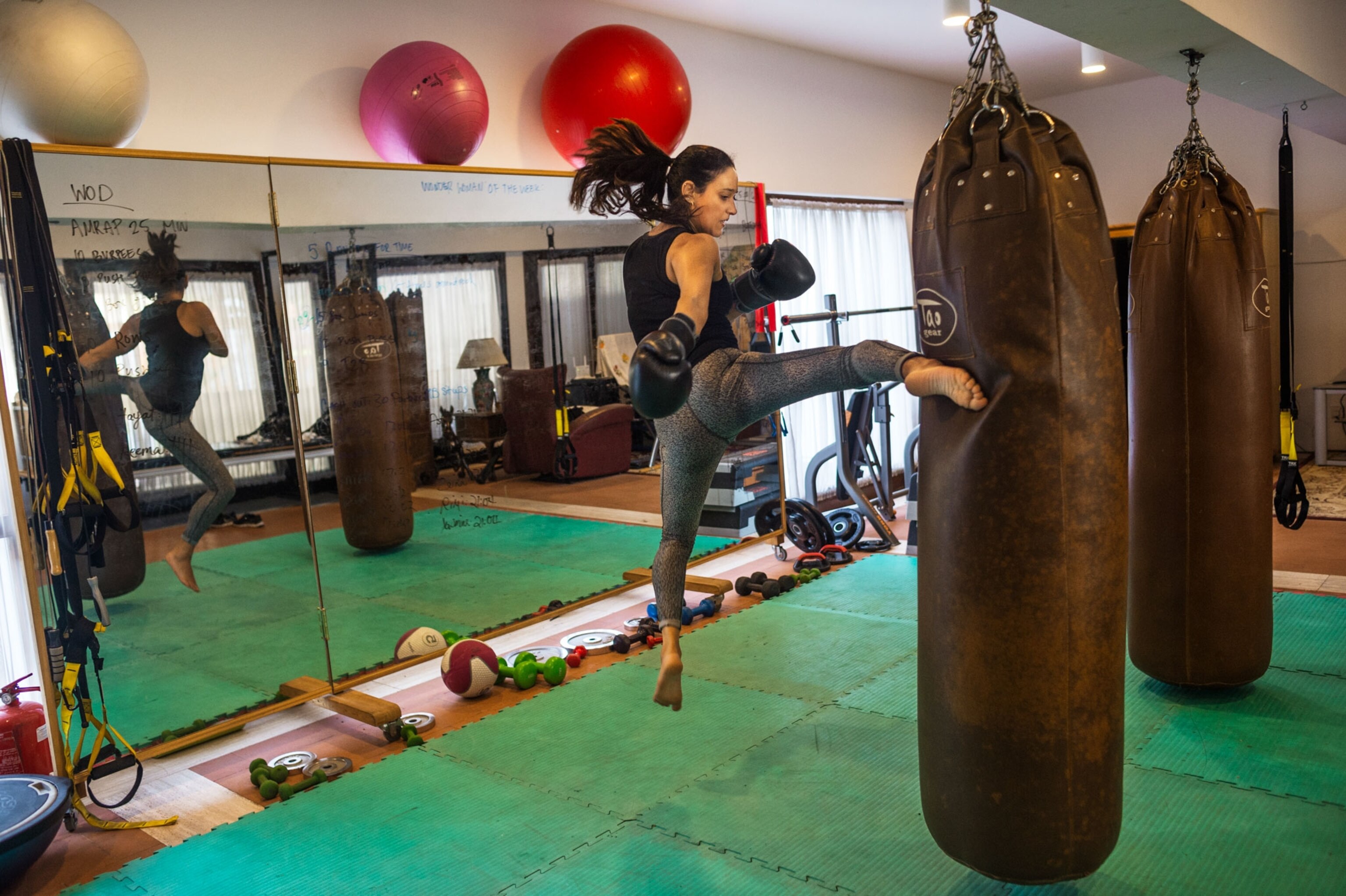 a woman kickboxing in Saudi Arabia