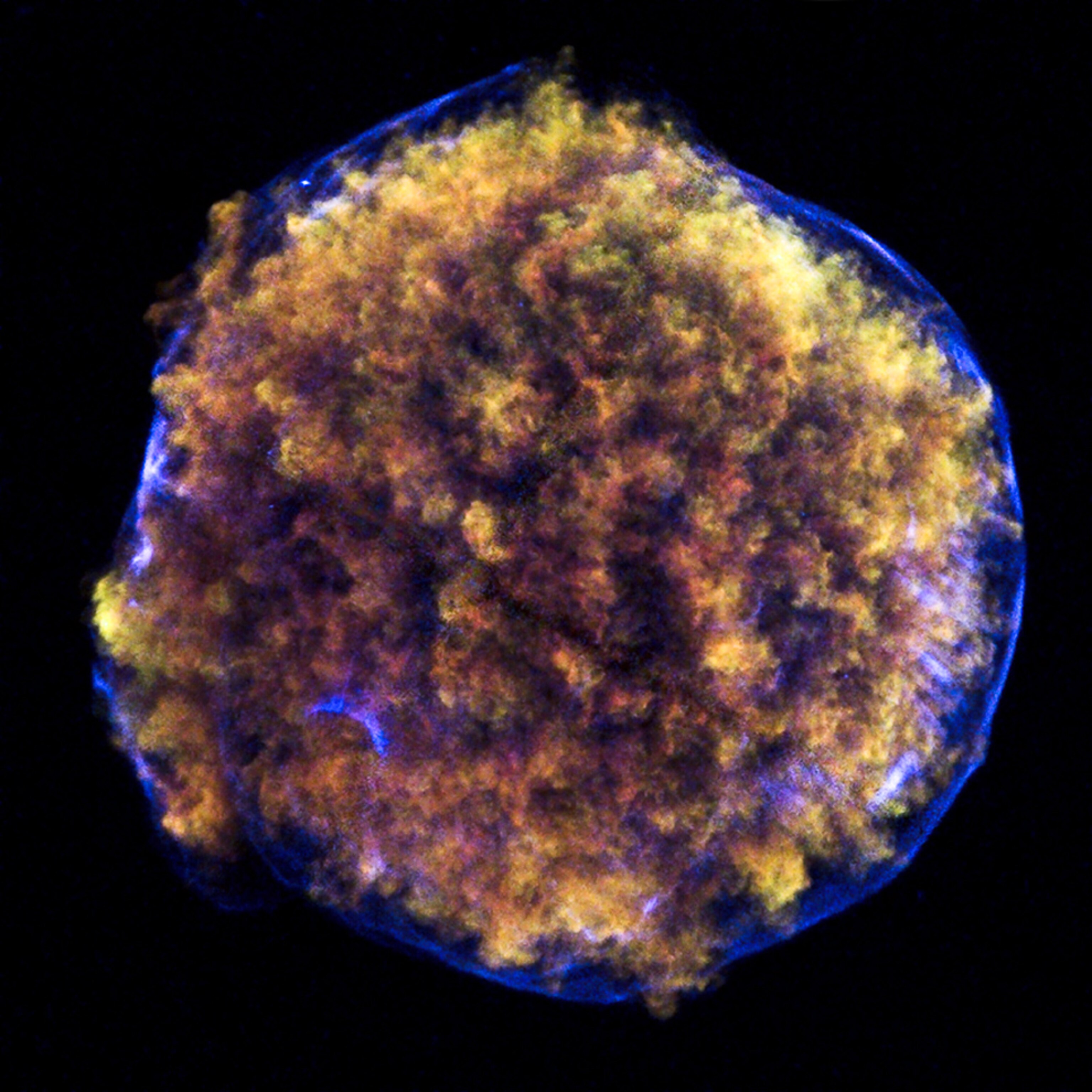 Composite picture of Tycho's supernova remnant showing an x-ray arc