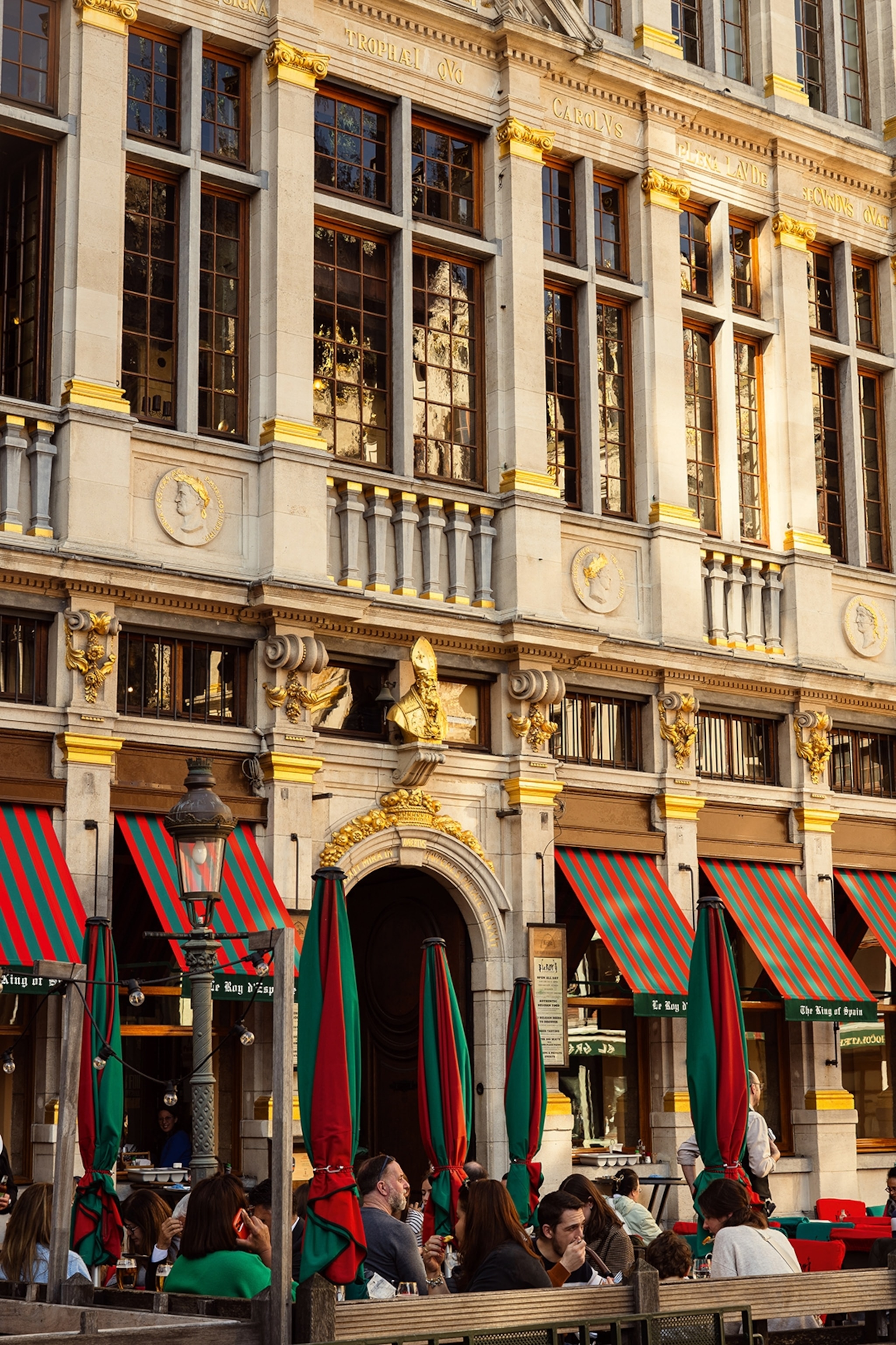 Street view of building with gold leaf detailing.