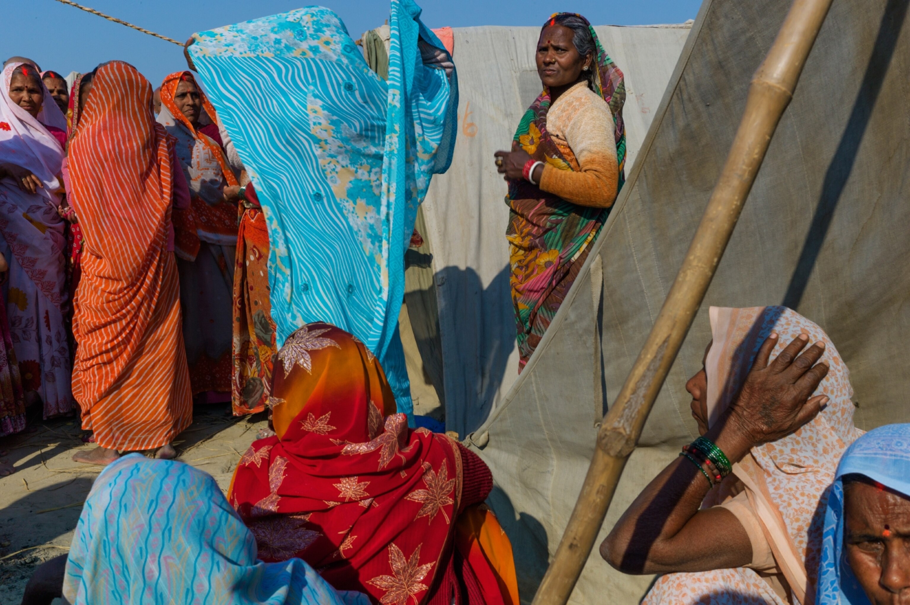 The millions of pilgrims voyaging to Allahabad for the Kumbh Mela stay in a temporary tent city constructed on the floodplain of the Ganges. Kalpwasis, above, come for at least a month and live a spartan lifestyle.