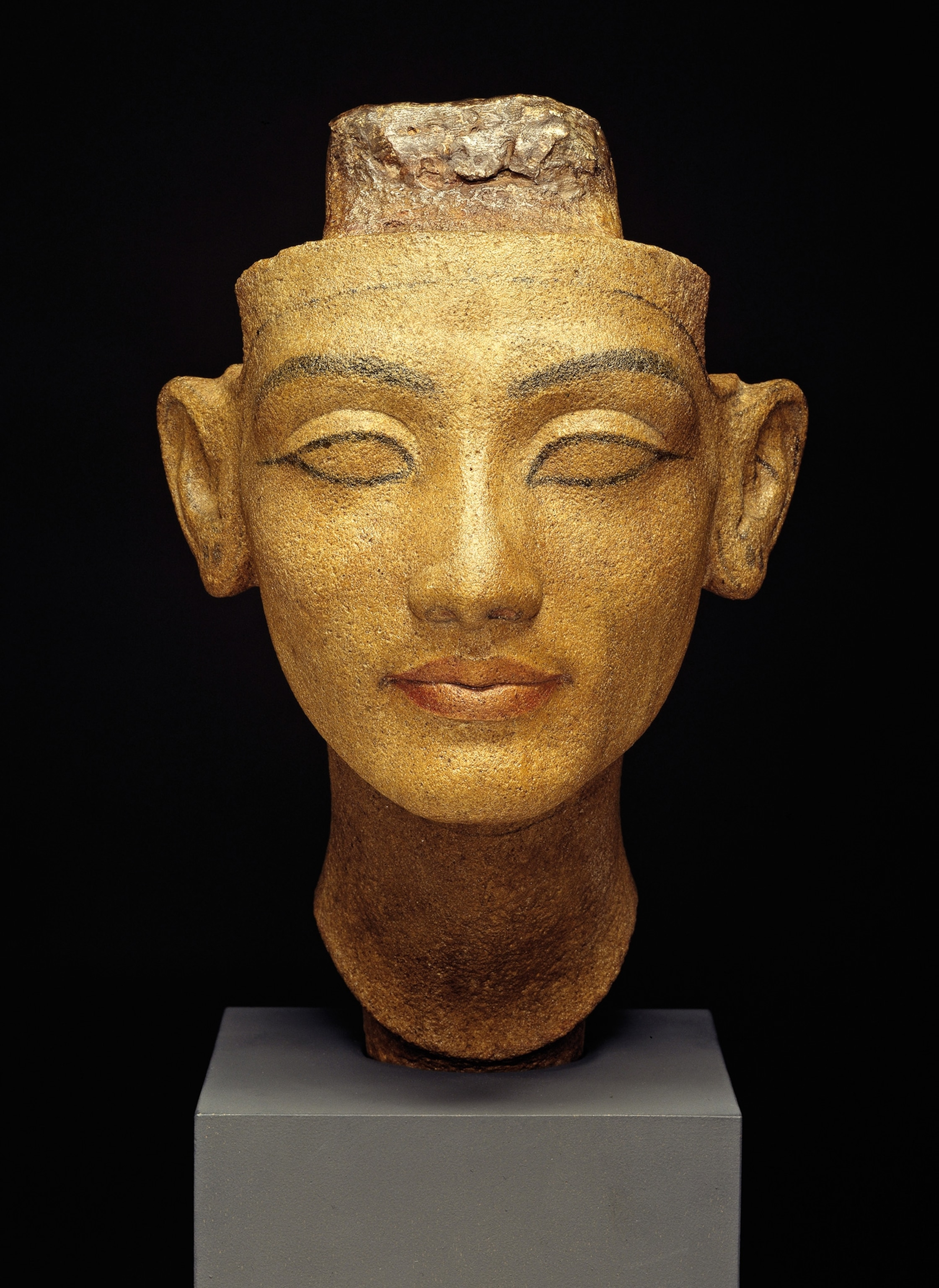 Nefertiti’s subtle smile is highlighted with red pigment in this bust, which probably depicts the young royal as a teenager. It's housed in the Egyptian Museum and Papyrus Collection at Berlin's Neues Museum.