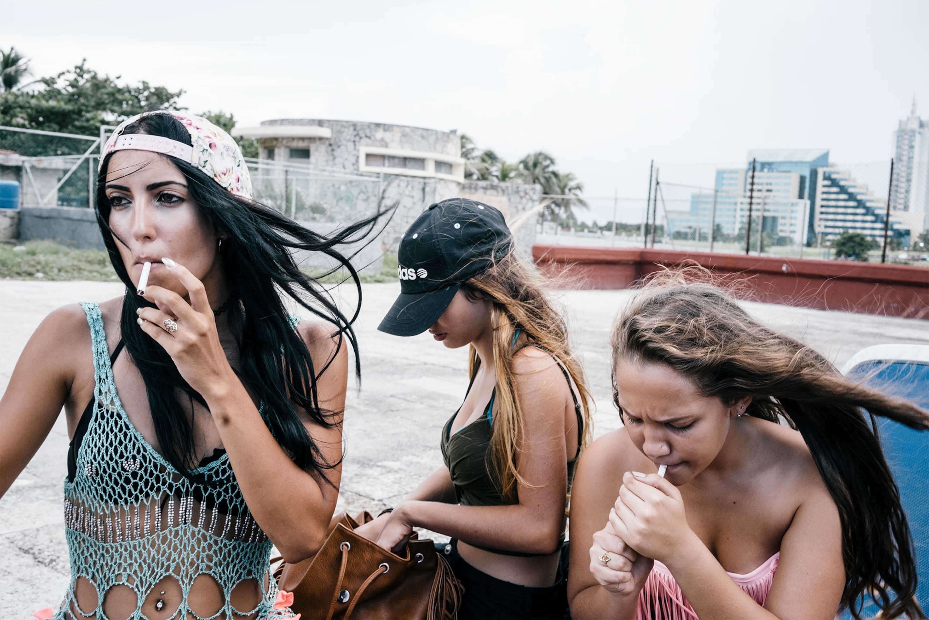 girls smoking cigarettes in Cuba