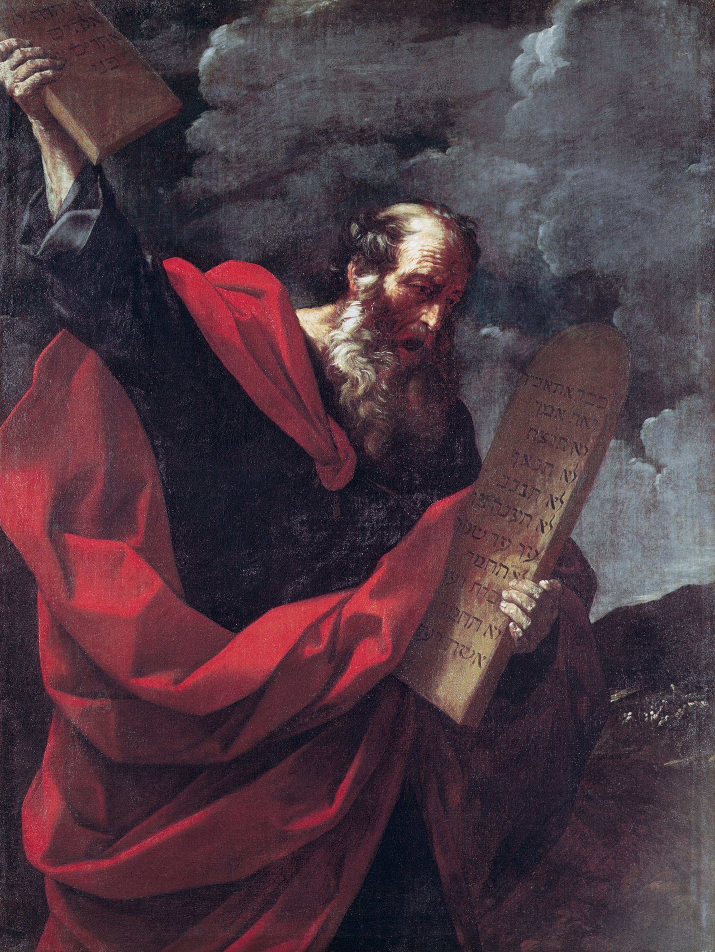 A painting of moses holding stone tablets upon which the Commandments are written