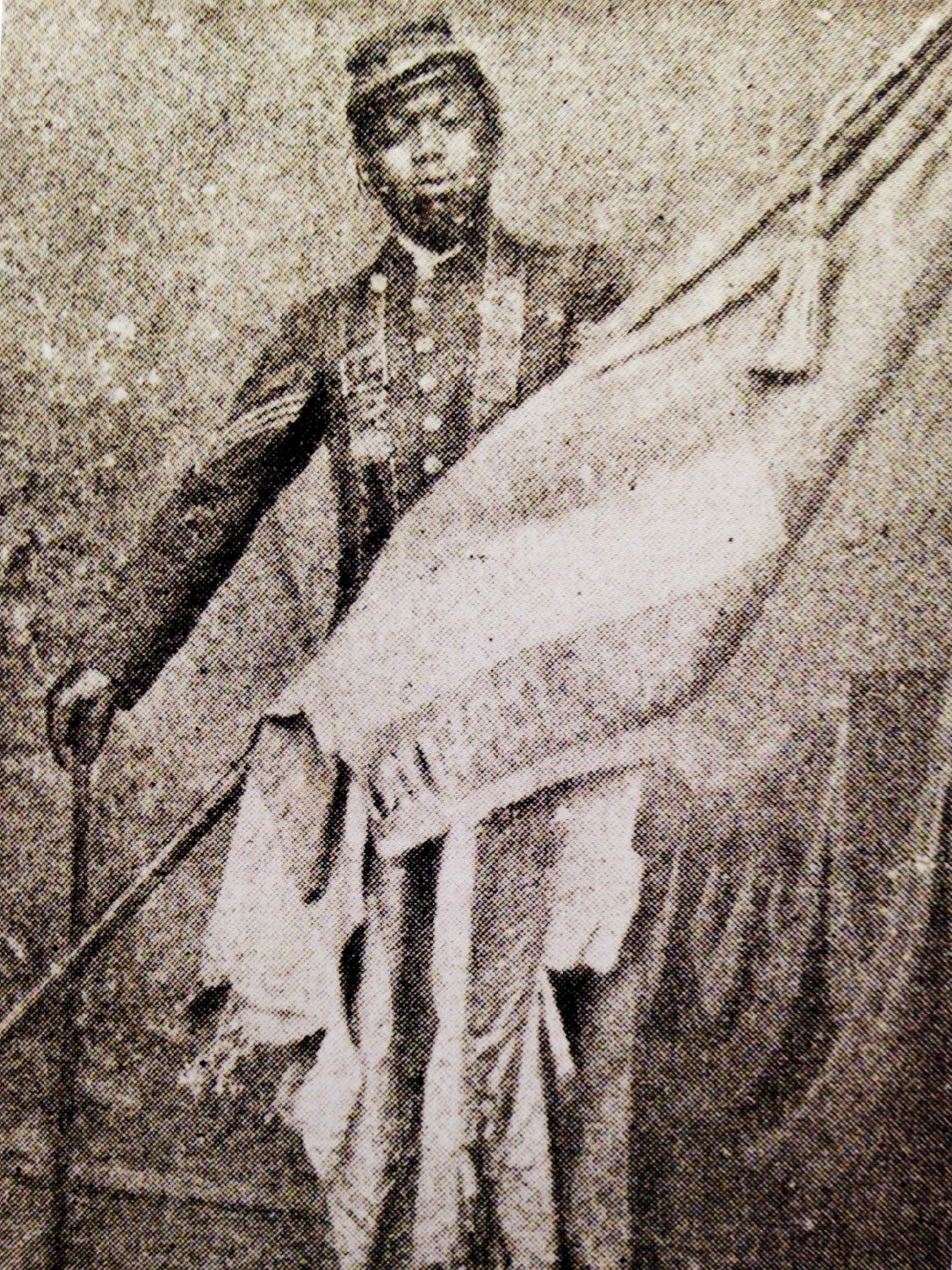 civil war soldier holding a flag