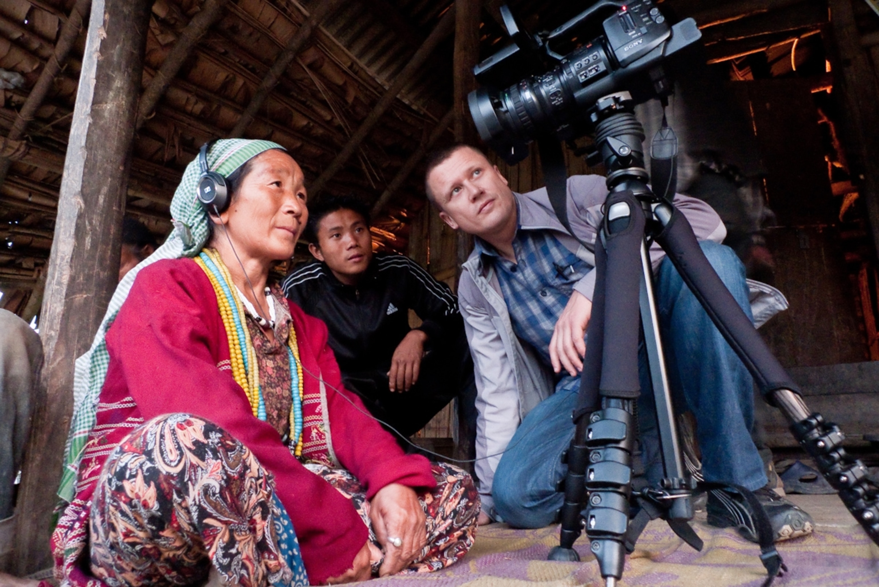 Abamu Degio watches a recording of herself