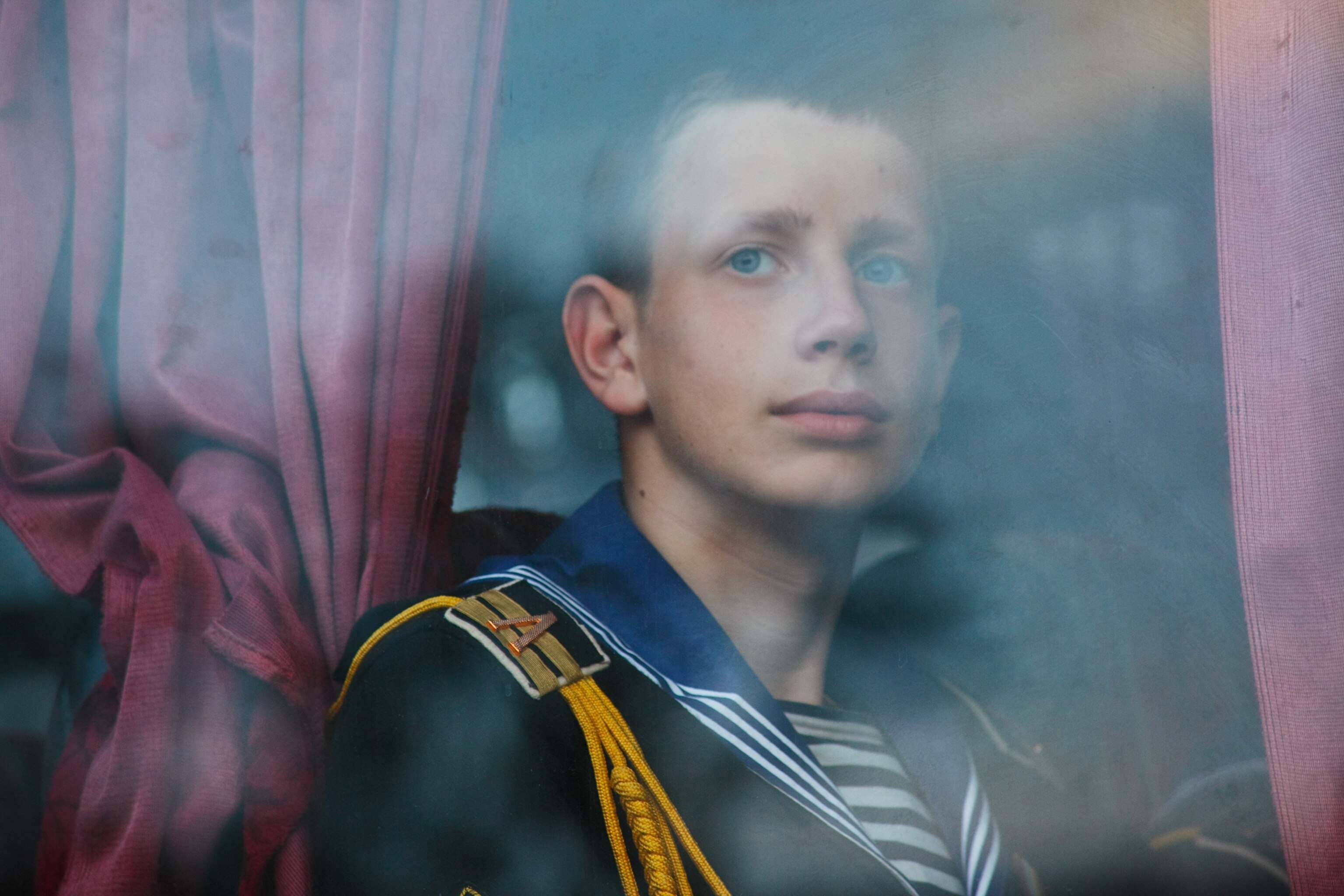 Navy cadets take the bus back to their barracks