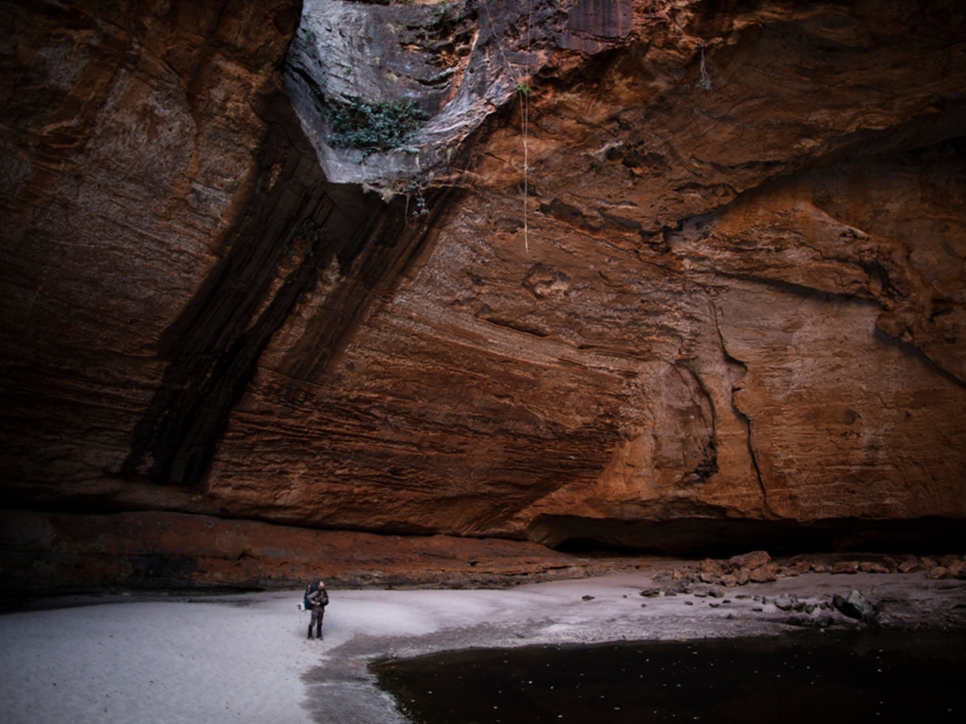 Sarah Marquis walking near a cave in Western Australia.
