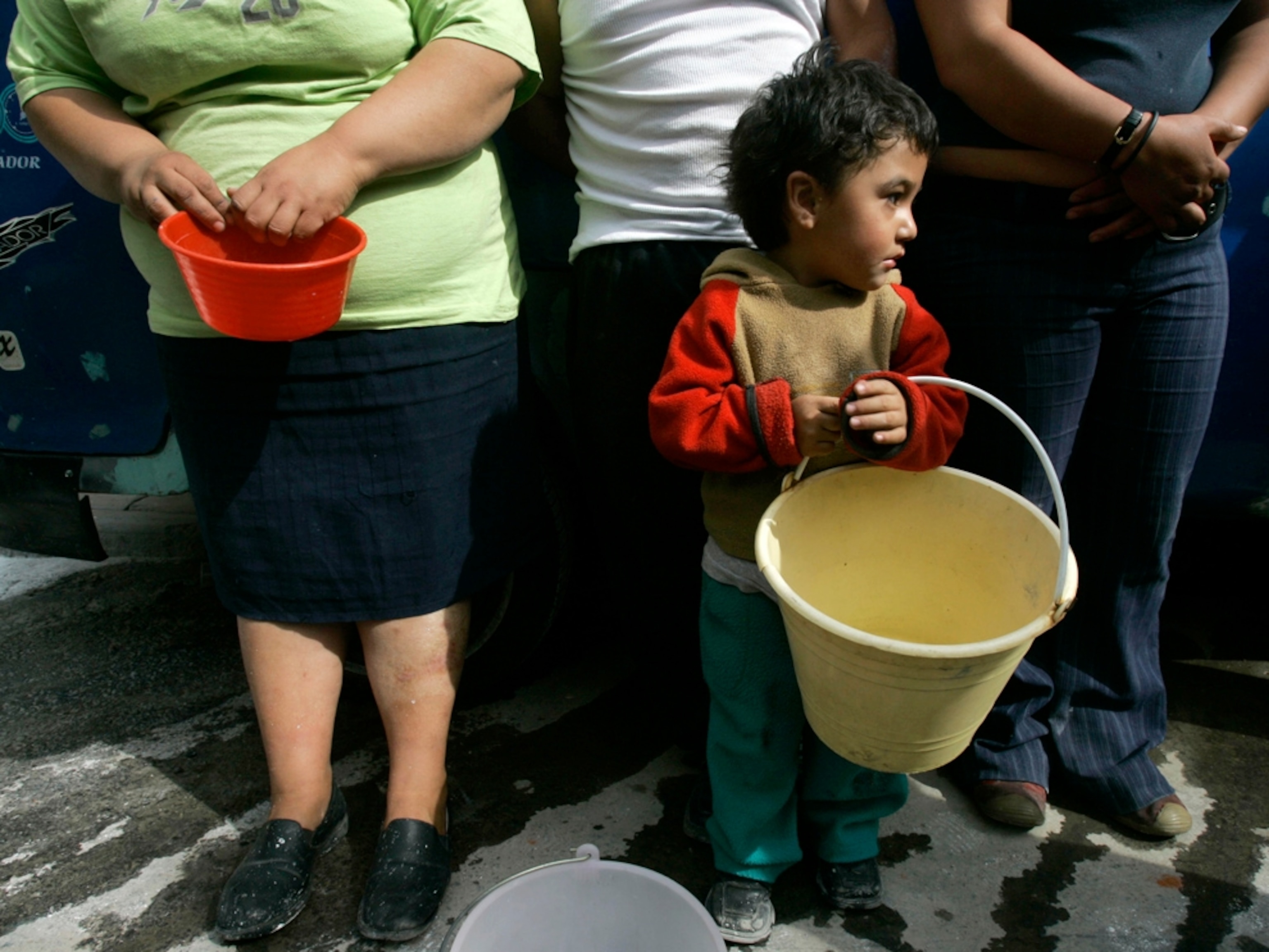 People waiting for water truck