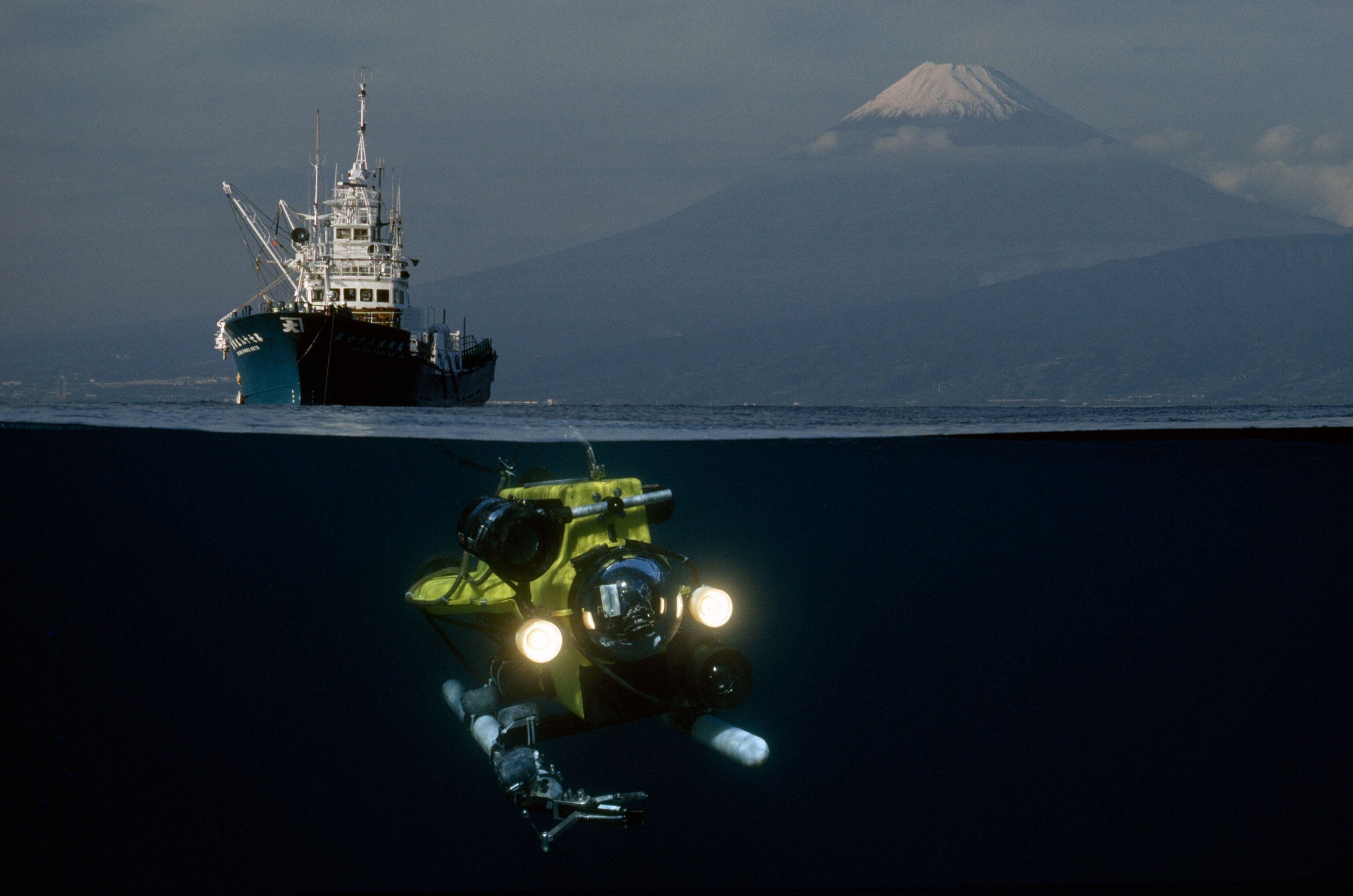 A bifocal view captures the robot Searover in little-explored waters, Suruga Bay, Honshu Island, Japan, 1990.