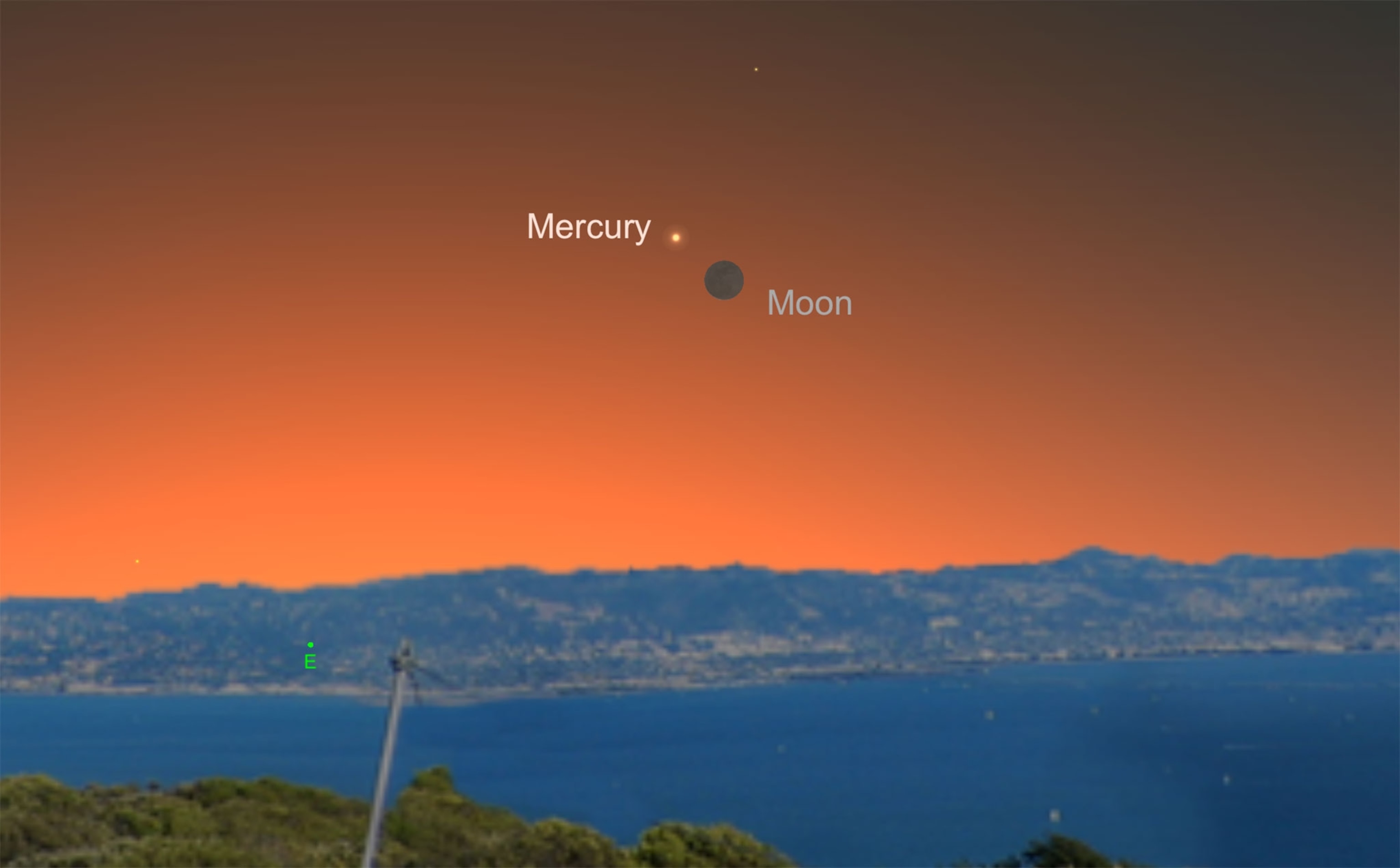 razor-thin crescent moon poses with faint Mercury in the very low eastern horizon.