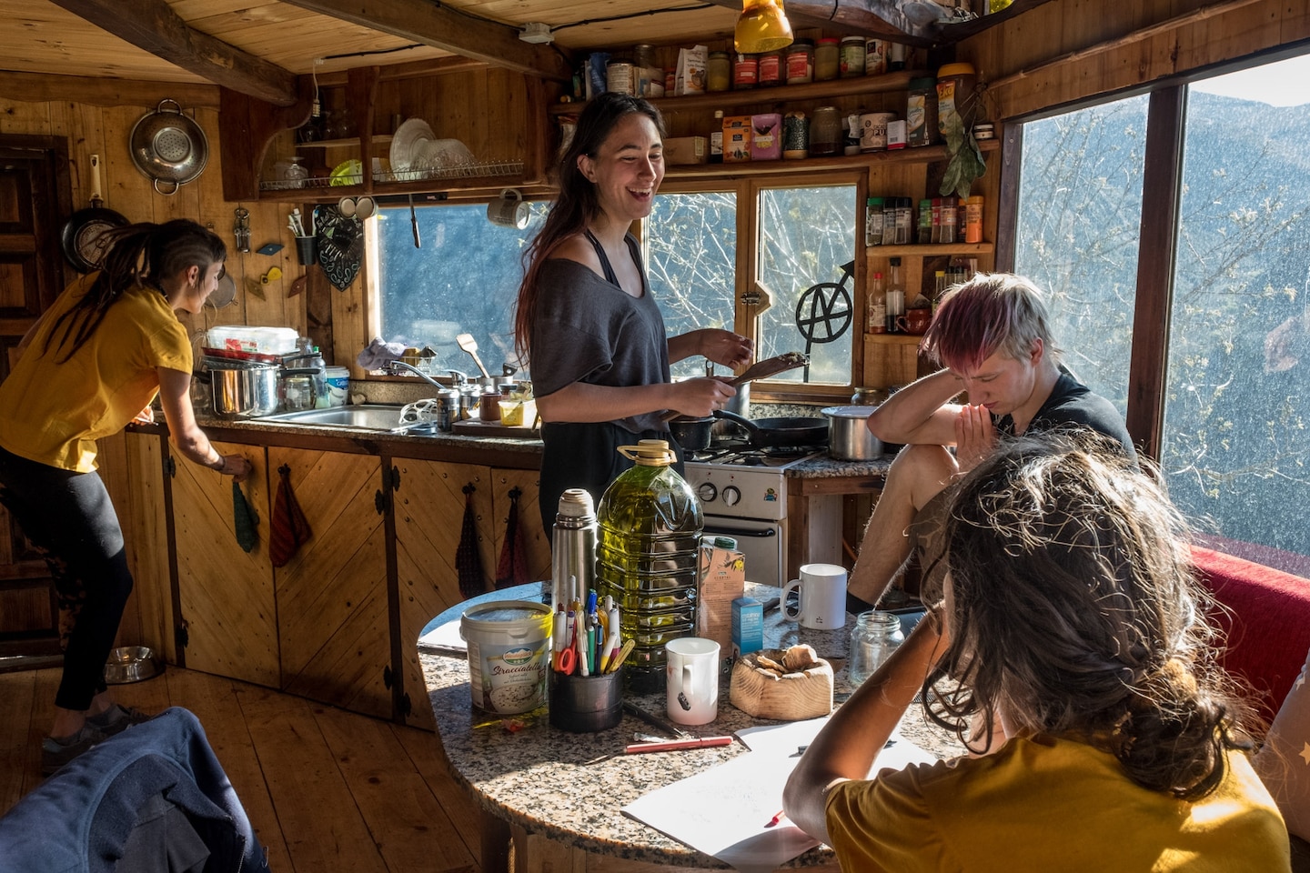 A group of people having breakfast in a home.
