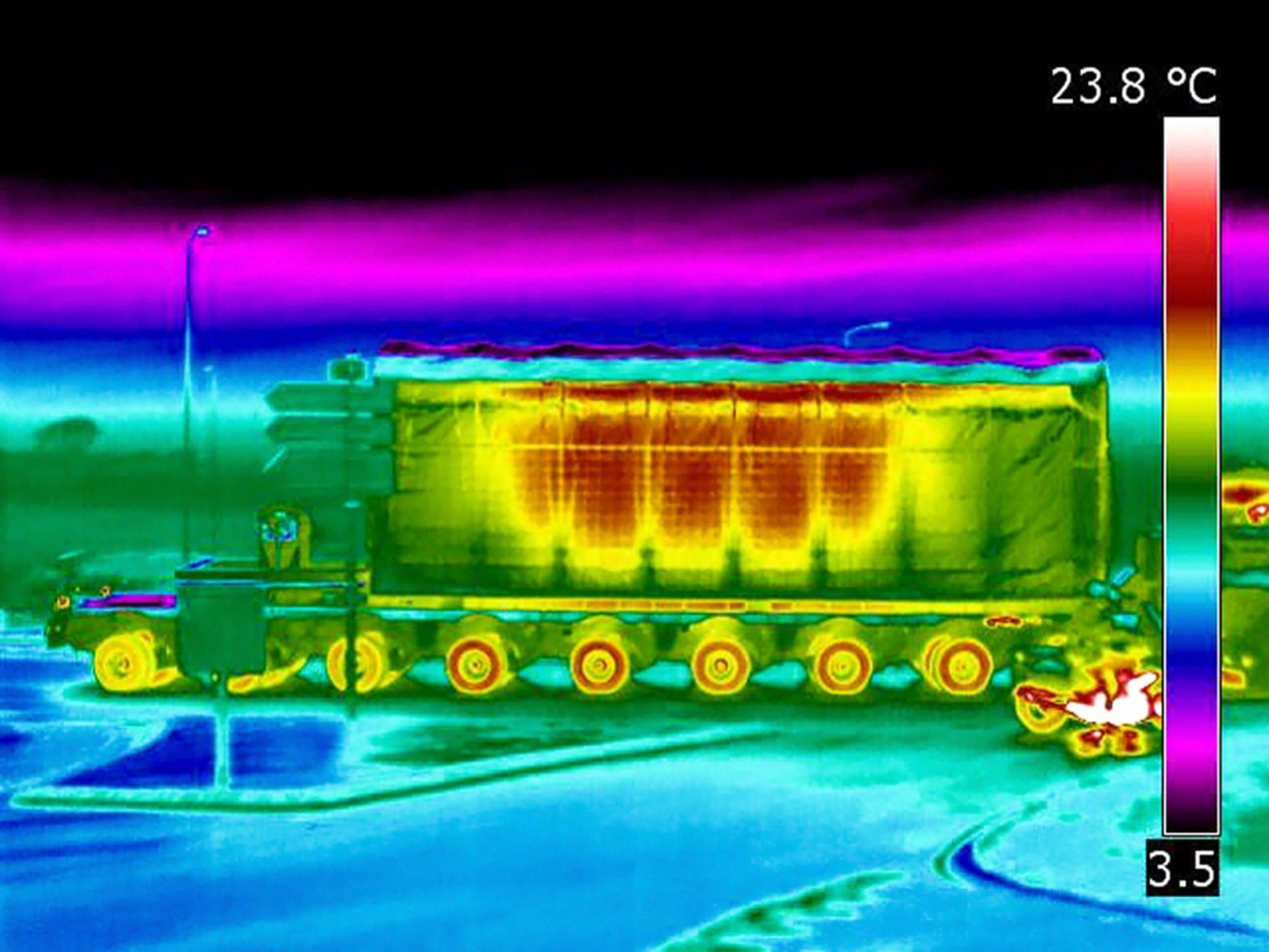 A train glows red with heat from nuclear waste in a thermal image (picture)