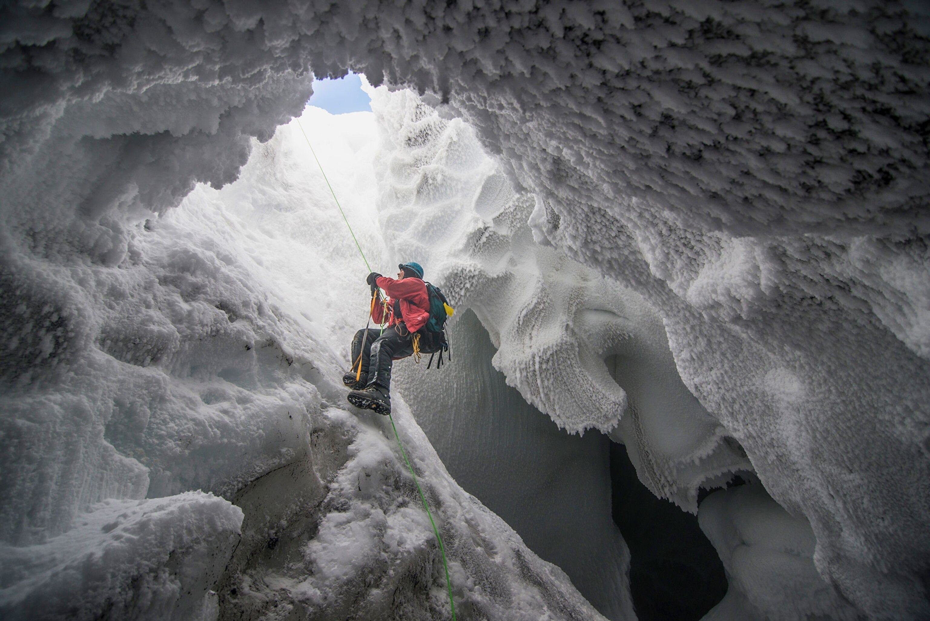 a climber in an ice cave