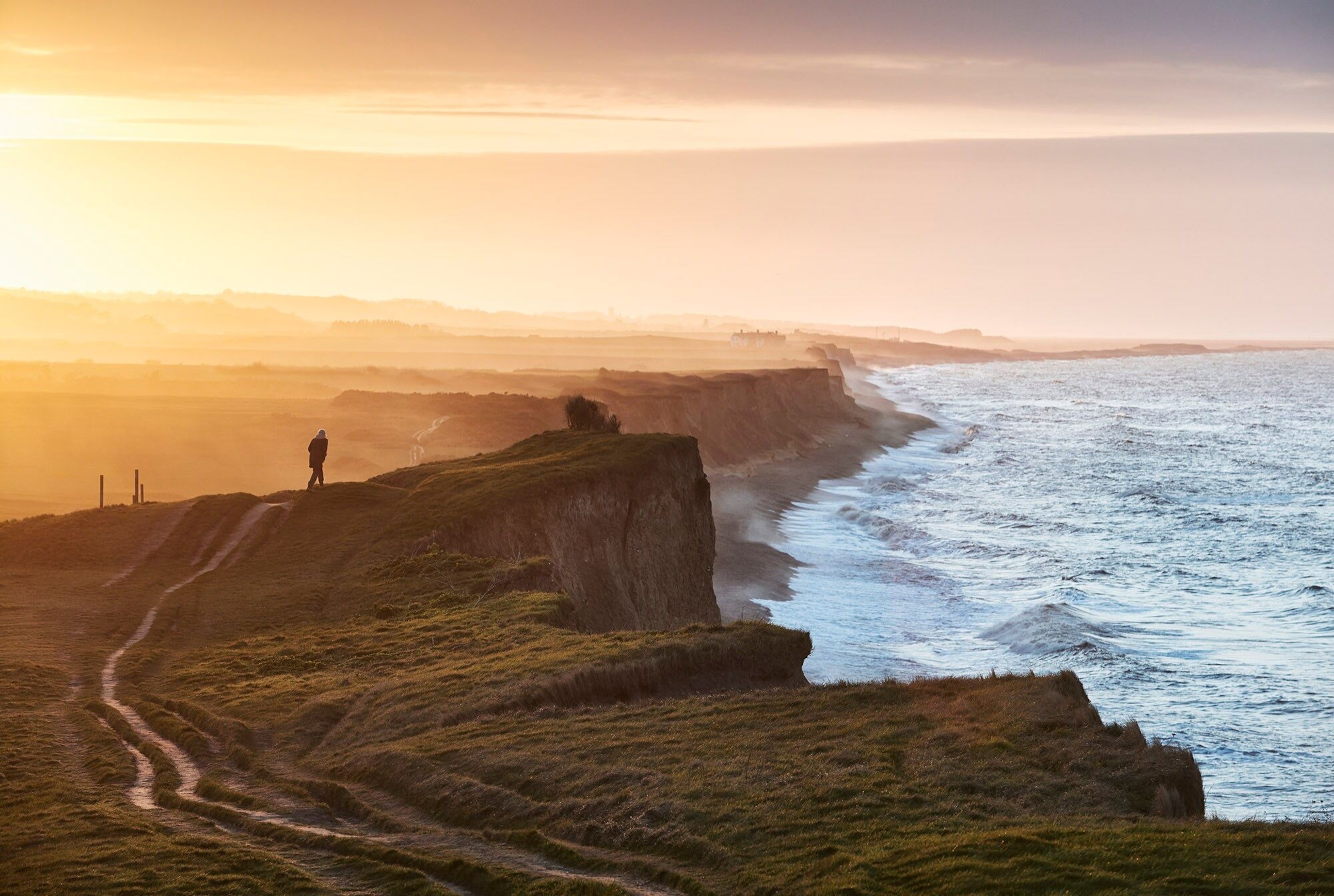 Richard's favourite image; had the sun not have broken through the clouds just as a woman walked across the scene for mere seconds, the image would not have been so successful.