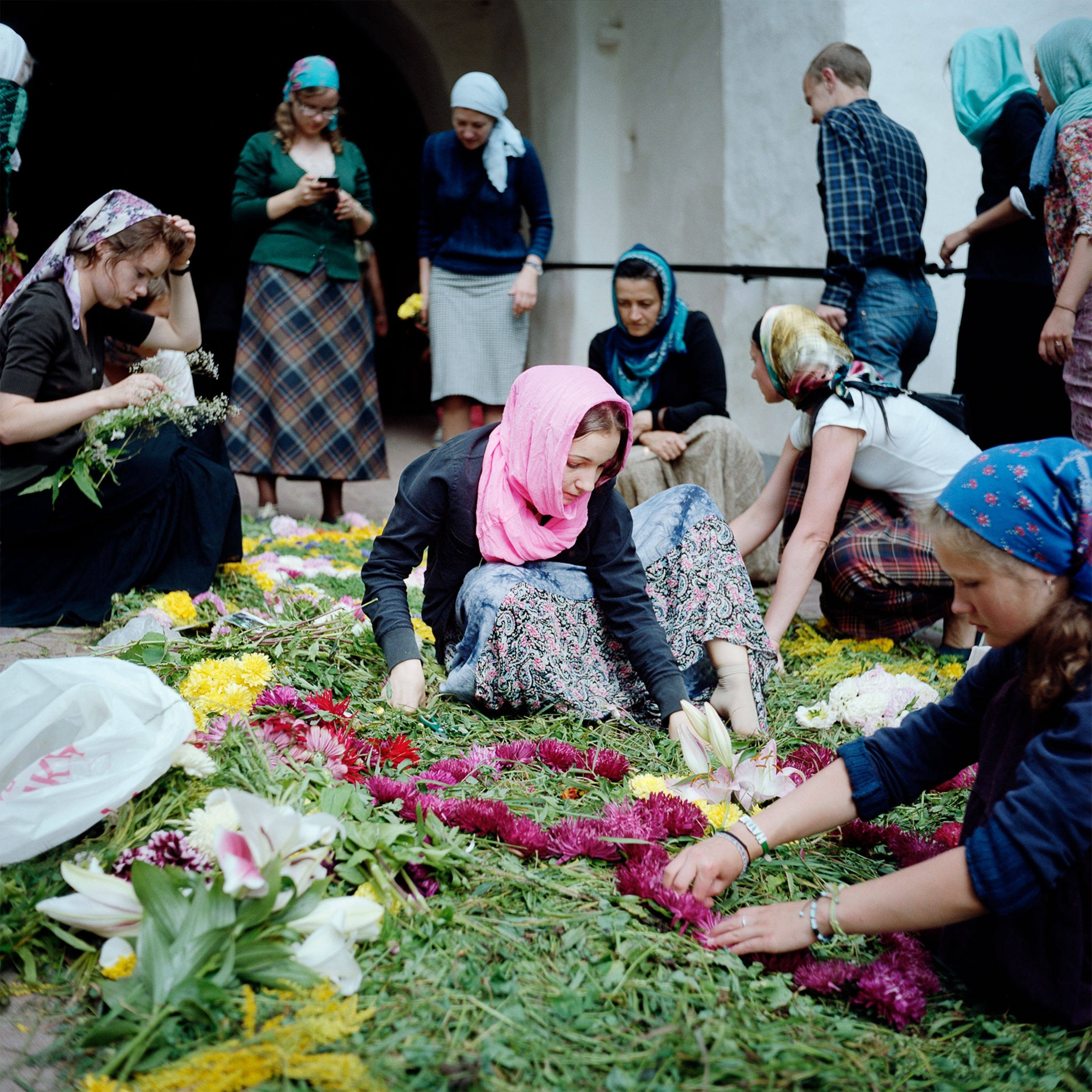 women laying flowers