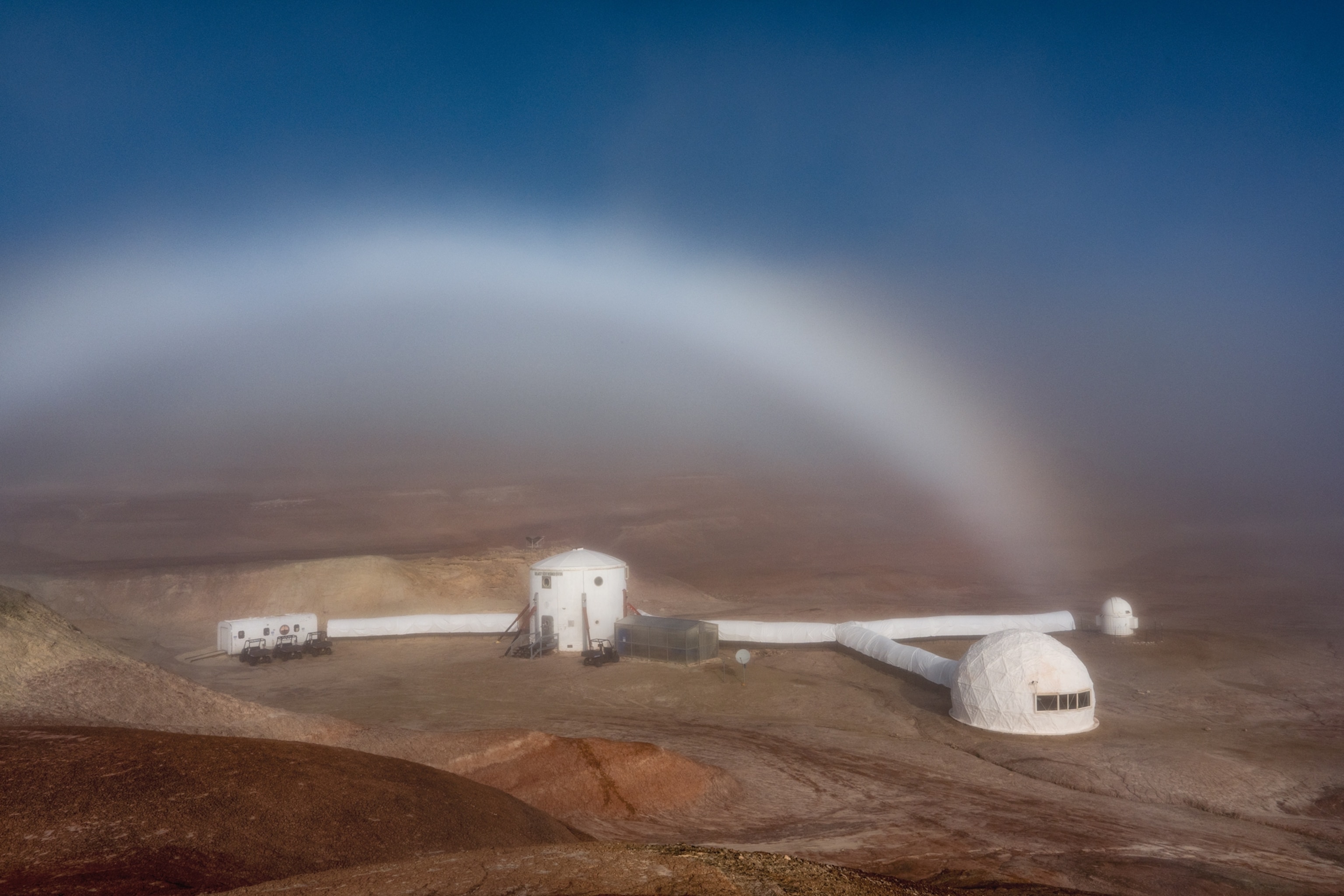 View of Mars Desert Research Station on Sol 12 outside of Hanksville, Utah on October 24, 2025. The fog rainbow appeared just after the crew exited the simulation.