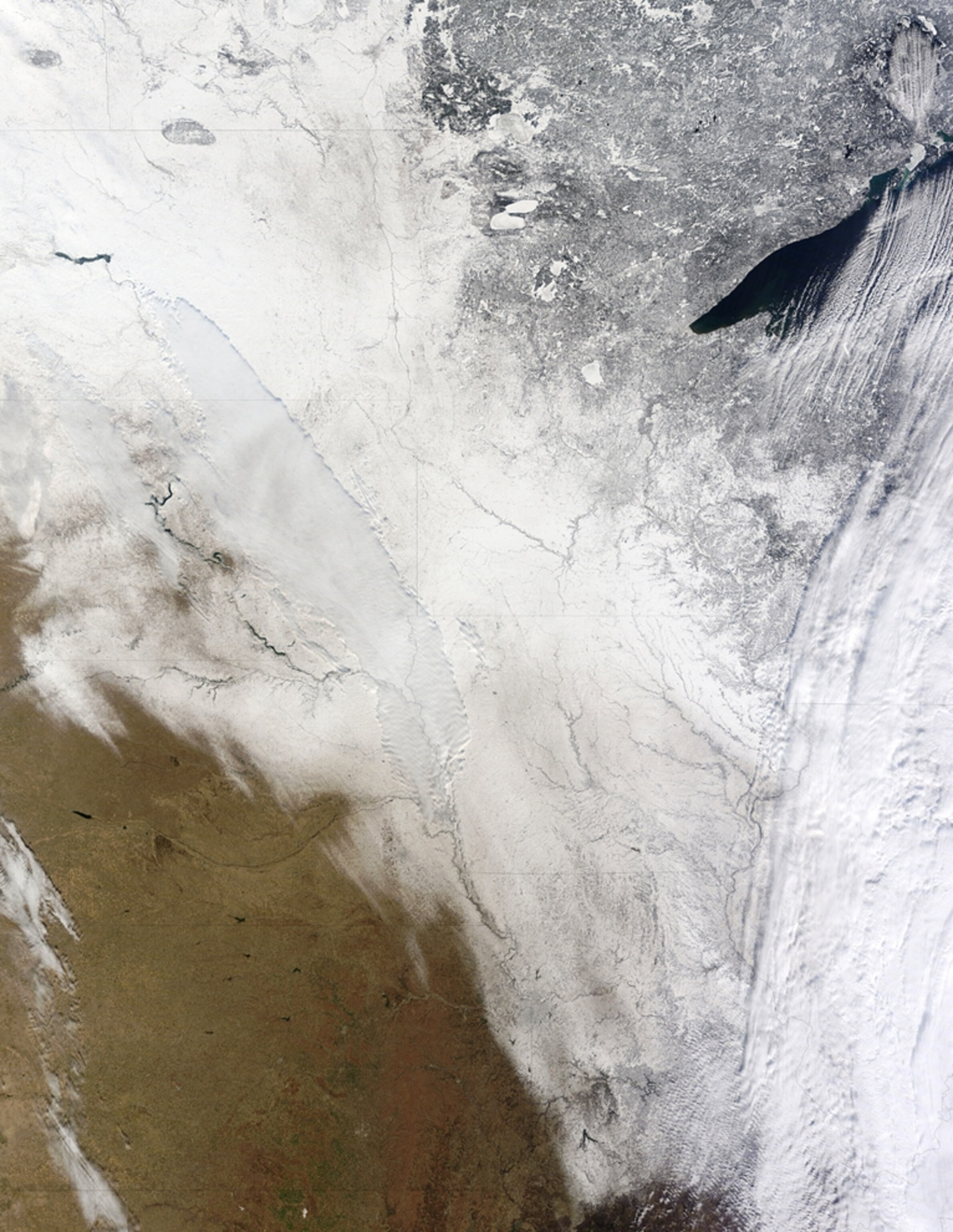 Snow covers the U.S. Midwest in a satellite picture.