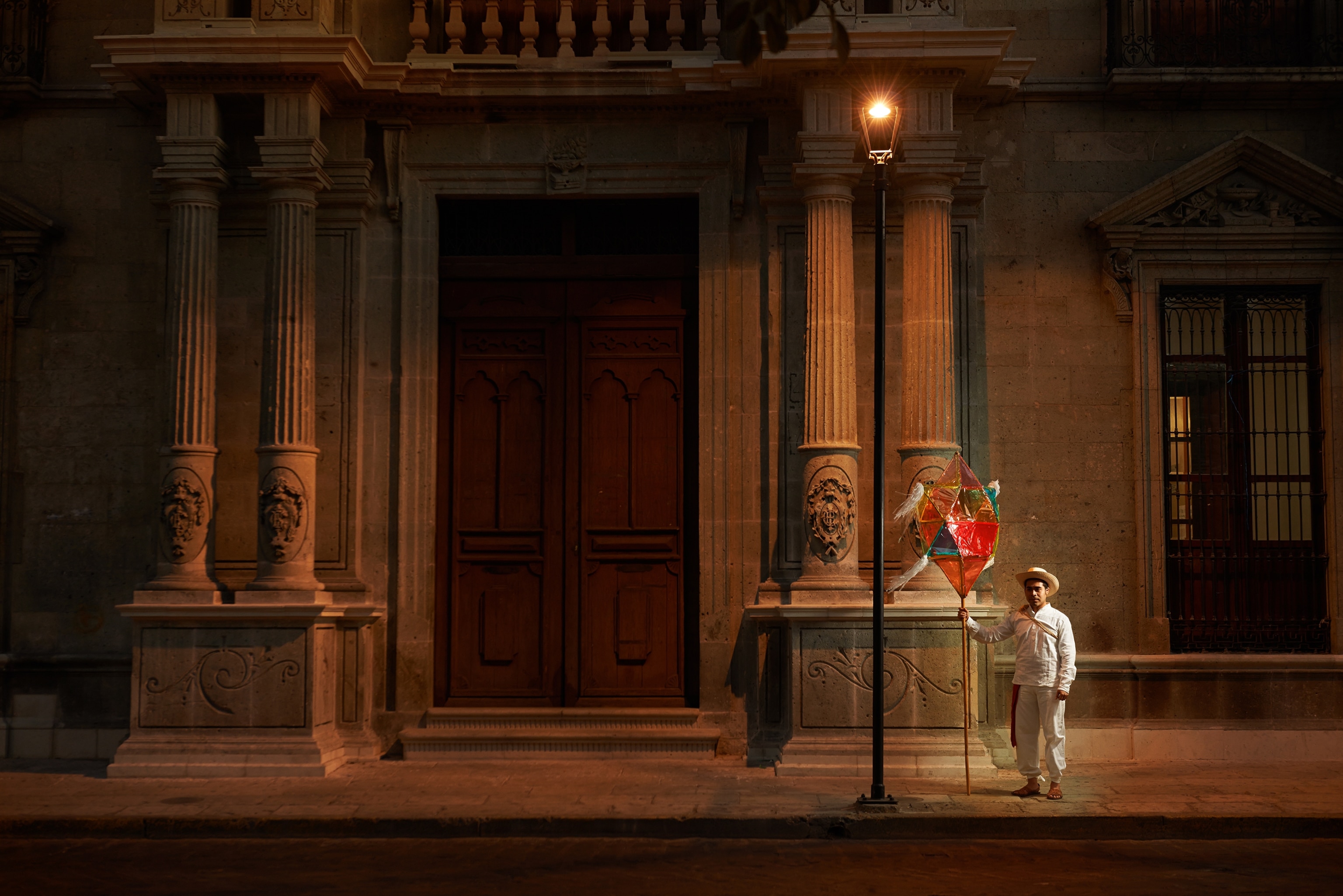 a lamplighter in Oaxaca, Mexico