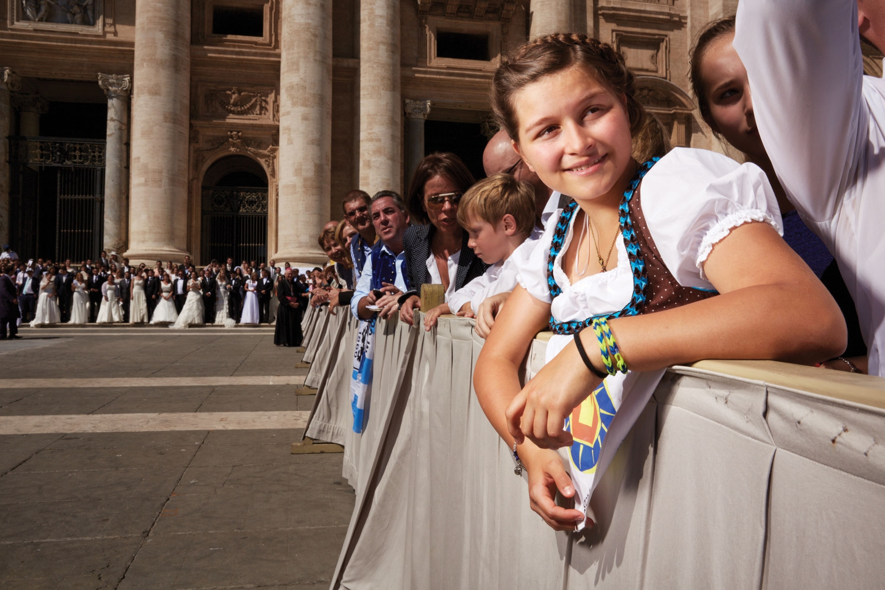little girl waiting to see Pope Francis in Vatican City