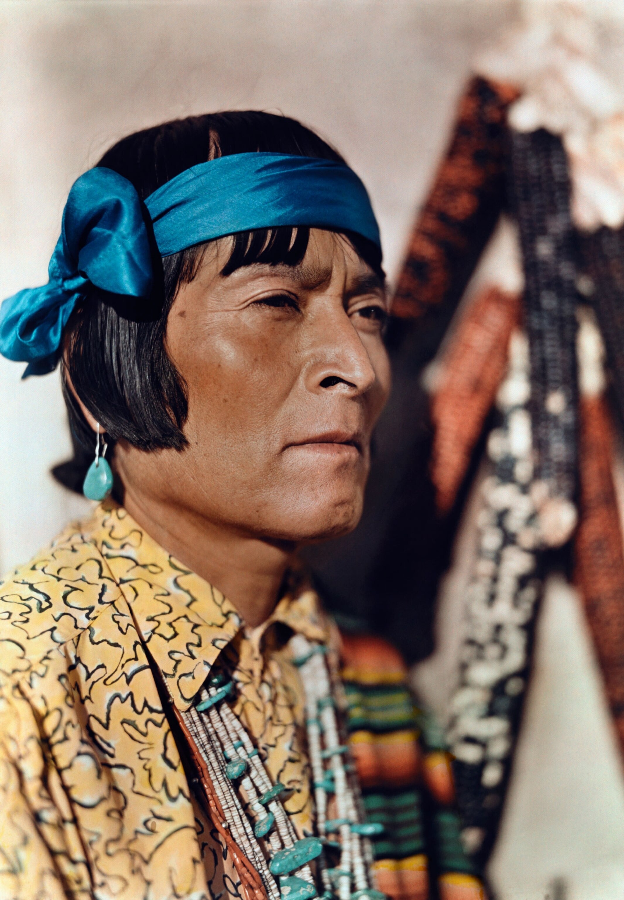 native american man wearing traditional style