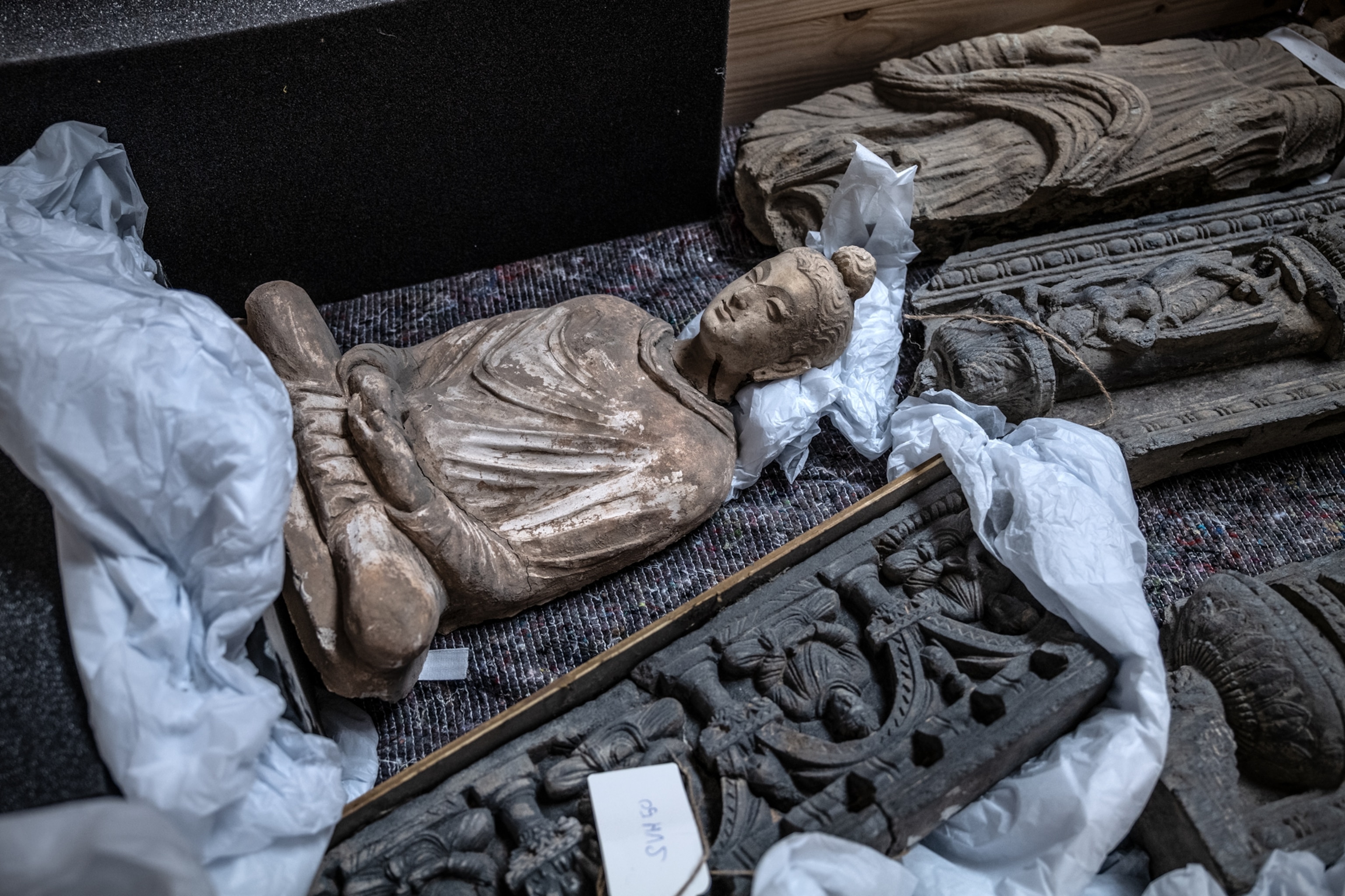 Artifacts lying on the floor to be packed