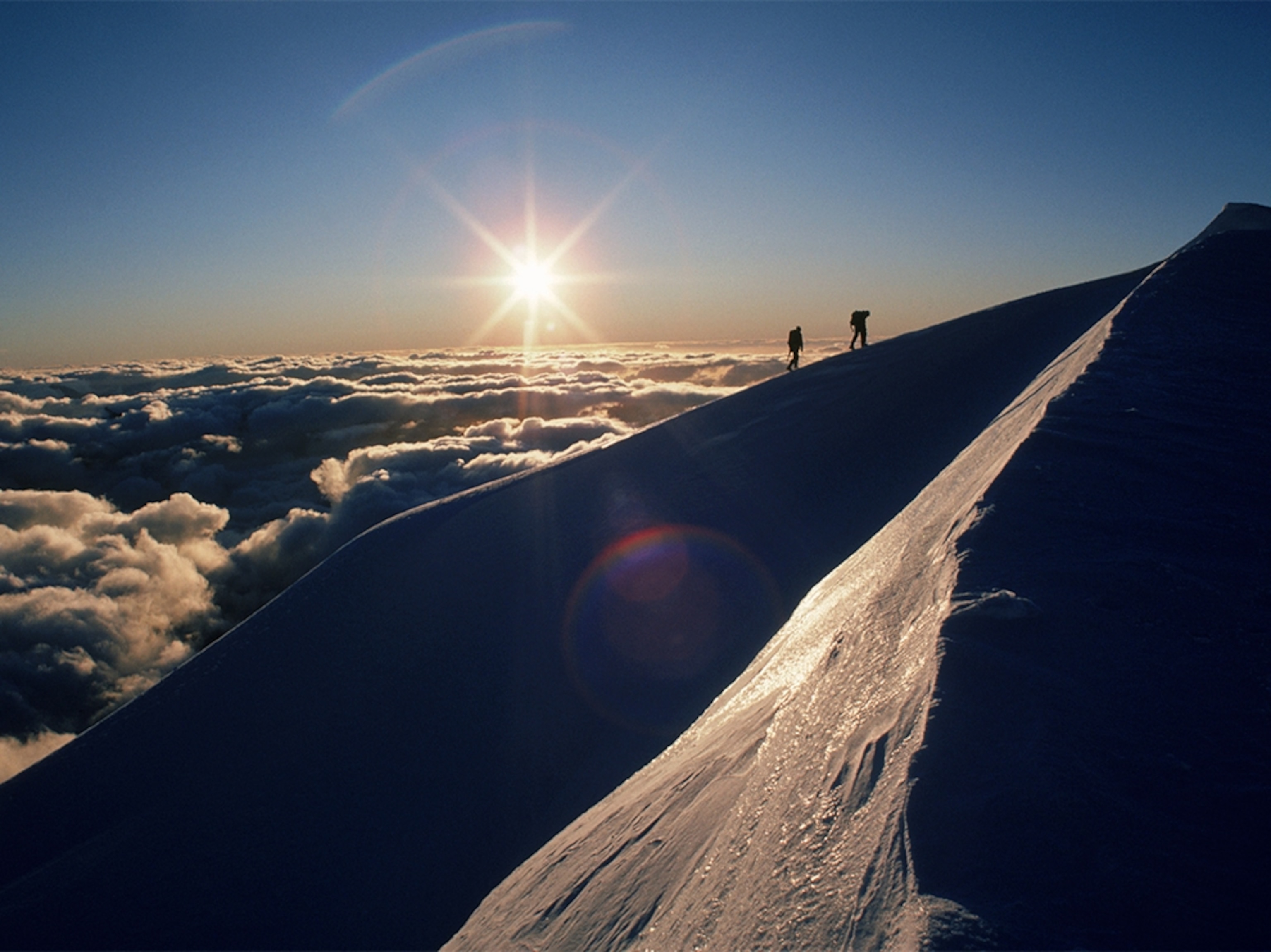mountain climbers in Mount Cook National Park, New Zealand