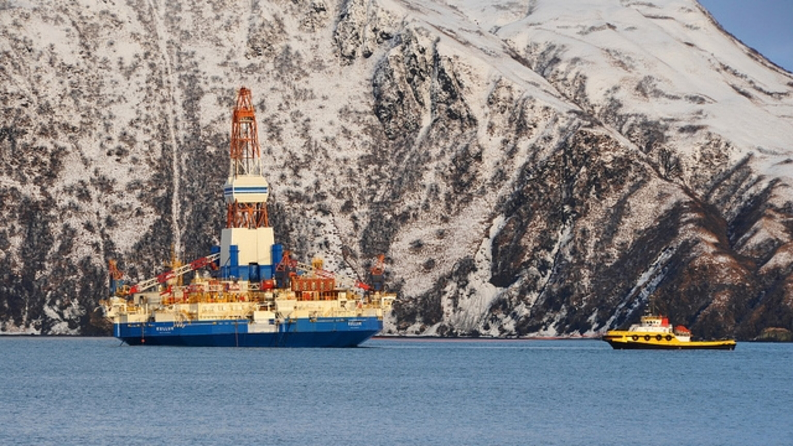 Shell's rig, the Kulluk, floats aside the yellow tug, the Alert, in Kiliuda Bay, Alaska, where it was towed after its New Year's Eve grounding. U.S. Coast Guard photo by Petty Officer 3rd Class Jonathan Klingenberg.