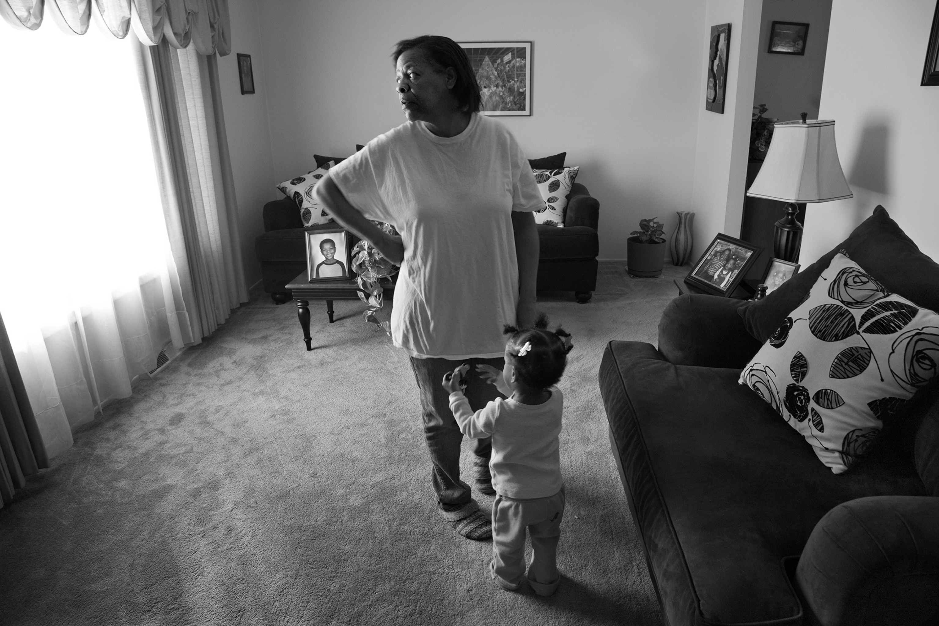 woman and young girl in their house in Flint, Michigan